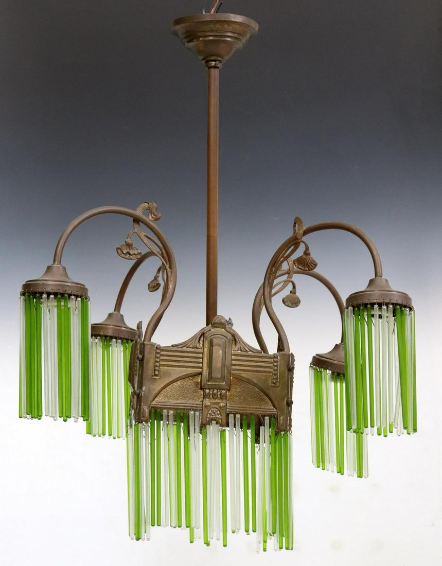 ART NOUVEAU GLASS STRAW FIVE-LIGHT CHANDELIER: Art Nouveau five-light chandelier, early 20th c., having central lantern with ornamentation in relief, issuing four curved and foliate accented arms, all hung with green and white glass straws, slight