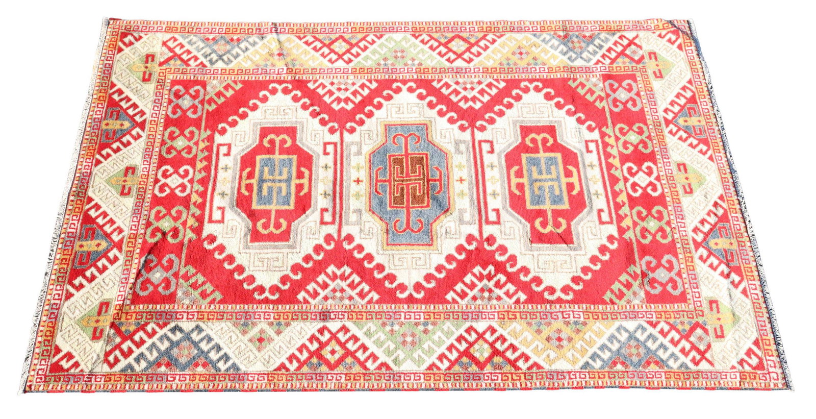 HAND-TIED KAZAK RUG, PAKISTAN, 9'9" X 6'7": Hand-tied Kazak rug, Pakistan, approx 9'9"l, 6'7"w **Please Note: All of the rugs offered in this auction would likely benefit from a professional cleaning. Estate rugs may show some wear and imperfec