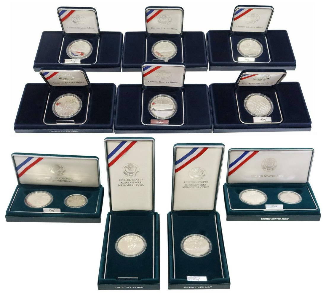(12) U.S. MINT COMMEMORATIVE PROOF SILVER DOLLARS: (lot of 12) U.S. Mint packaged proof Commemorative silver dollars: (2) Korean War Memorial, 1991; (1) Columbus Quincentenary, two coin set, dollar and half dollar; (1) Civil War Battlefield, two coin 