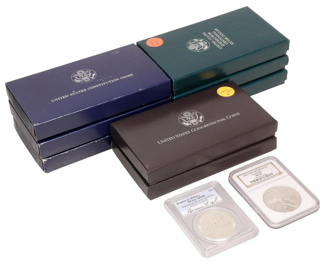 (12) US COMMEMORATIVE SILVER COINS, SOME GRADED: (lot of 12 coins) U.S. Commemorative Coins in original US Mint packaging; (1) 1994 Women in Military $1 coin, PCGS signed within slab Jessica Lynch, graded MS-69 (Lynch was Iraqi War POW); (1) 2006P, 