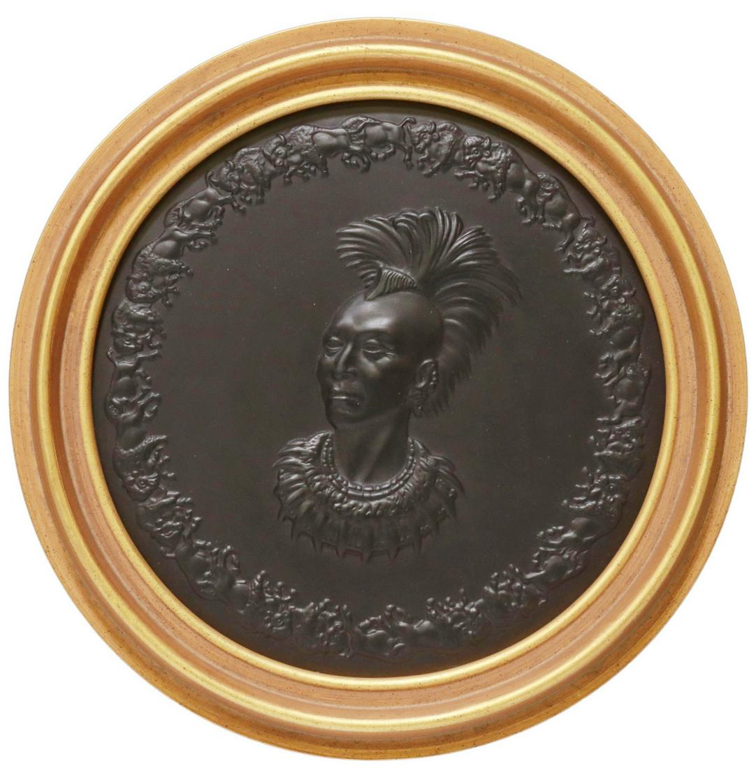 WEDGWOOD BLACK BASALT CHIEF BLACKHAWK PLAQUE: Wedgwood black basalt commemorative plaque, c.1971, "Chief Blackhawk" from the "First Americans Series," after Charles Banks Wilson (American, 1918-2013), originally modeled by Eric Owen (English, 190