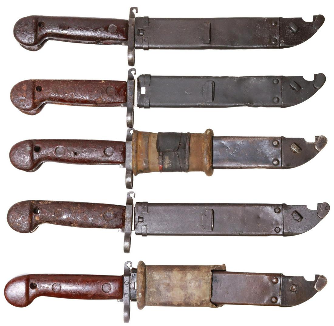 (5) RUSSIAN-ROMANIA AKM-1 SAWBACK BLADE BAYONETS: (lot of 5) Russian Kalashnikov AKM 1 sawback blade bayonets, Romania, each with 5.75" blade, central cutout, wire cutting loop at guard, wood handle with push button release, steel sheath, overall: 13