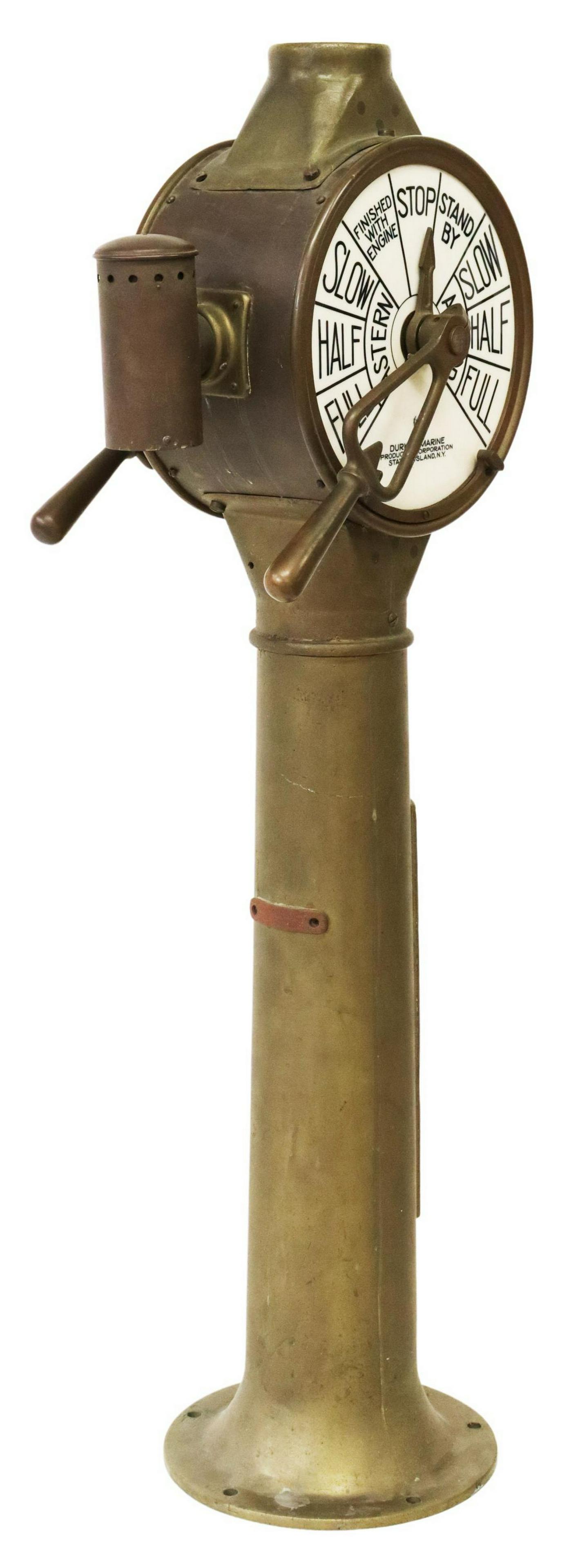DURKEE MARINE BRASS SHIPS ENGINE ORDER TELEGRAPH: Patinated brass ships engine order telegraph, Durkee Marine Products Corporation, Staten Island, New York, with Lenox china dials, on integral circular base, lacking extension tube, on one side the di