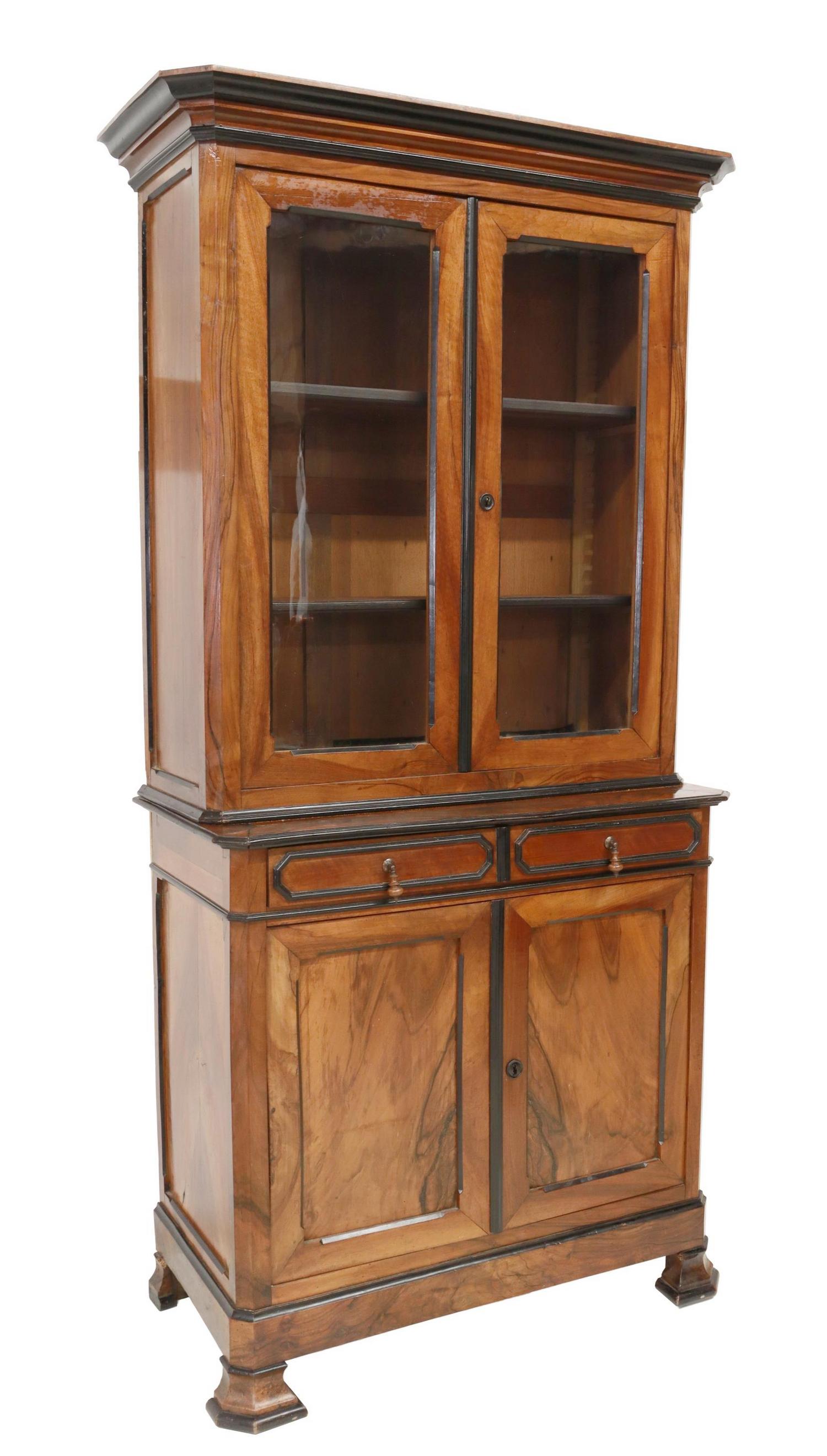 FRENCH LOUIS PHILIPPE PERIOD WALNUT SIDEBOARD: French Louis Philippe period walnut sideboard, mid 19th c., parcel ebonized trim, upper glazed cabinet doors, interior shelves, lower case fitted with a single frieze drawer, over double-door cabinet,