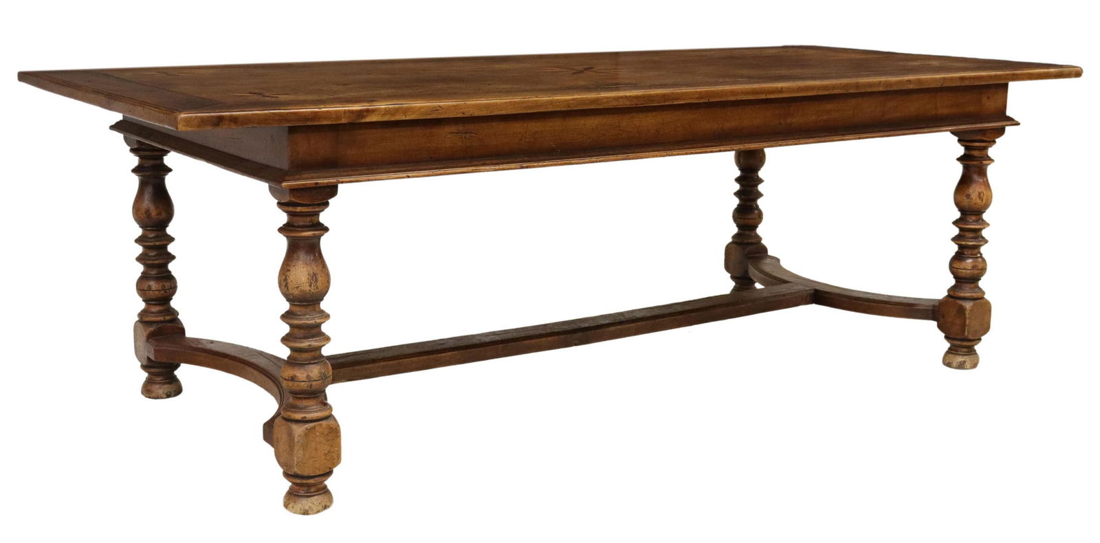 RUSTIC FRENCH STAR PARQUETRY DINING TABLE, 90.5"L: Rustic French walnut dining table, 19th c., having rectangular top with parquetry stars, rising on turned legs, joined with shaped cross stretcher, ending on bun feet, approx 30"h, 90 5/8"l, 40.25"w,