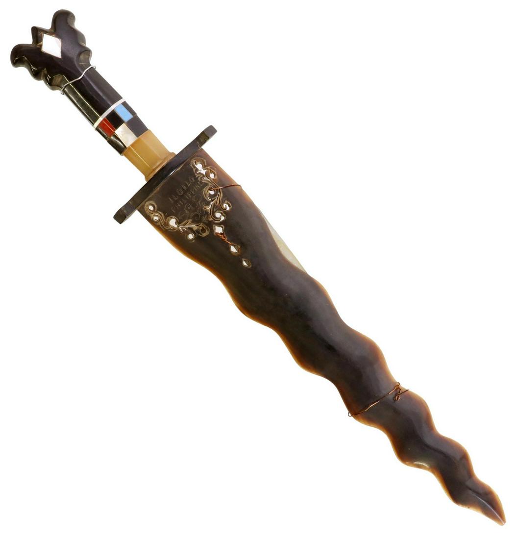 ORNAMENTAL MORO KRIS WITH HORN BLADE, PHILIPPINES: Ornamental Moro Kris sword, Iloilo City, Philippines, mid 20th c., 12 5/8" Carabao horn blade, handle fashioned from horn and scrap plastics, overall: approx 18"l, 0.5lbs Start Price: $50.00
