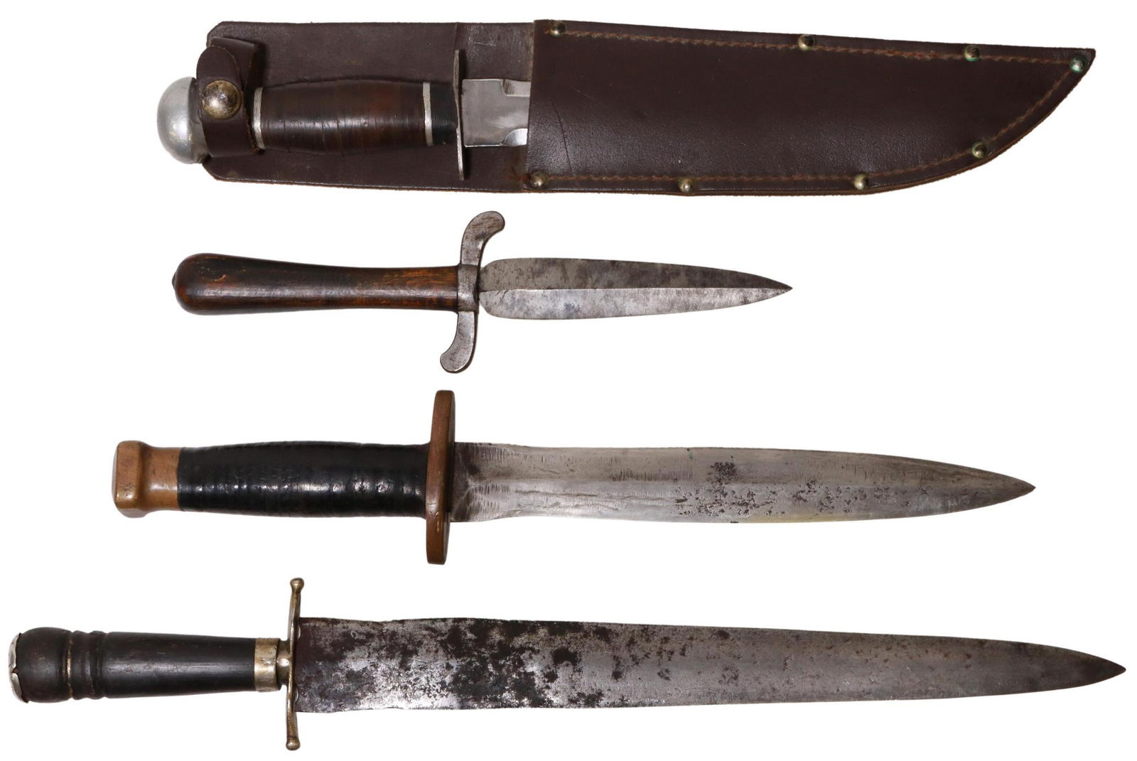 (4) DAGGER BLADE KNIVES: (lot of 4) Dagger blade knives, 20th c., some with 19th c. elements: (1) 8" unmarked blade, brass guard, leather handle, brass pommel, overall: 12.25"l; (1) 7" unmarked blade, aluminum guard, stacked