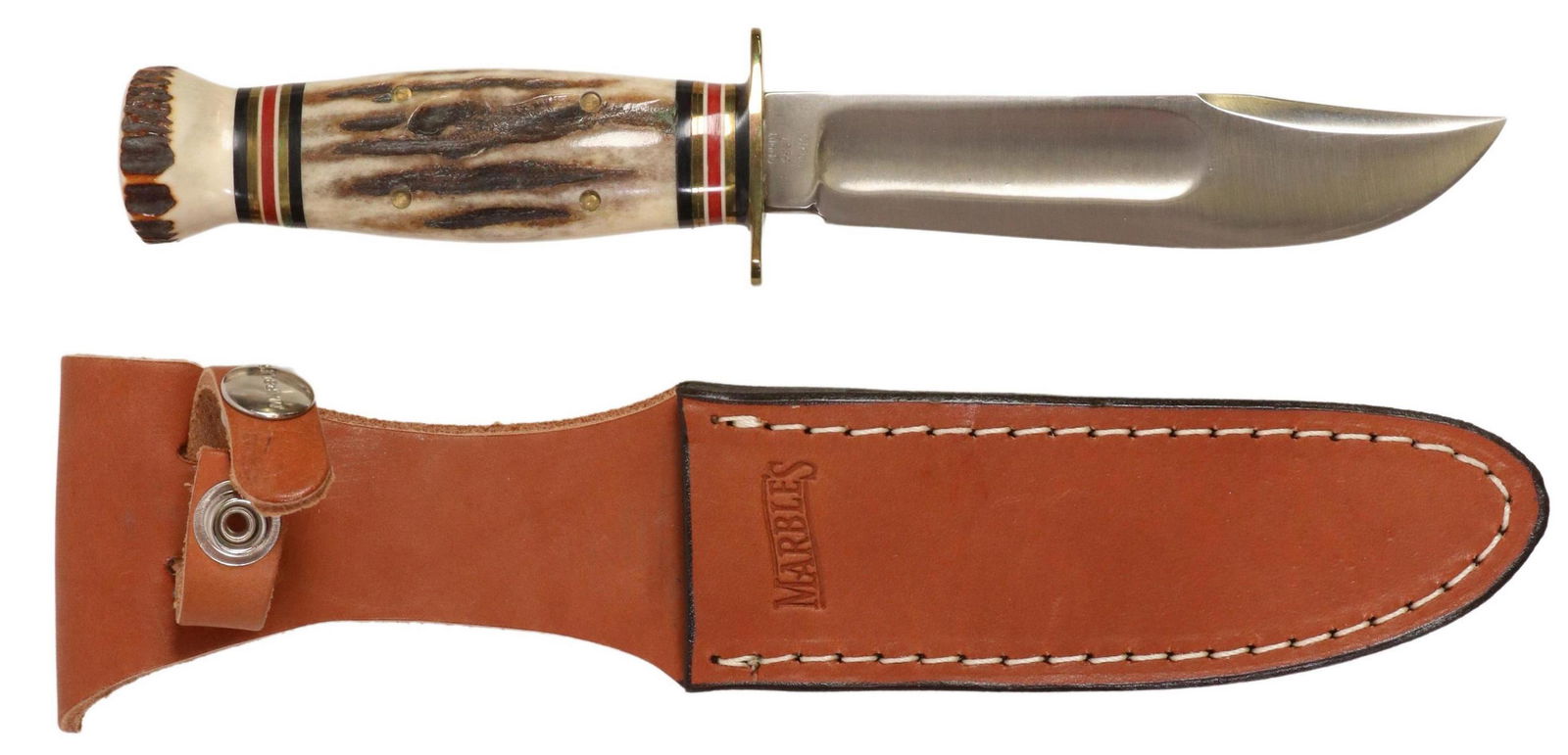 MARBLE FIXED BLADE MODEL 46 KNIFE, ORIGINAL BOX: Marbles fixed blade knife, Model 46, appearing as a not used collectible, 5" clip point blade marked at the ricasso "Circa 1939 Blade", the opposite ricasso with Marbles logo, brass guard with some ve