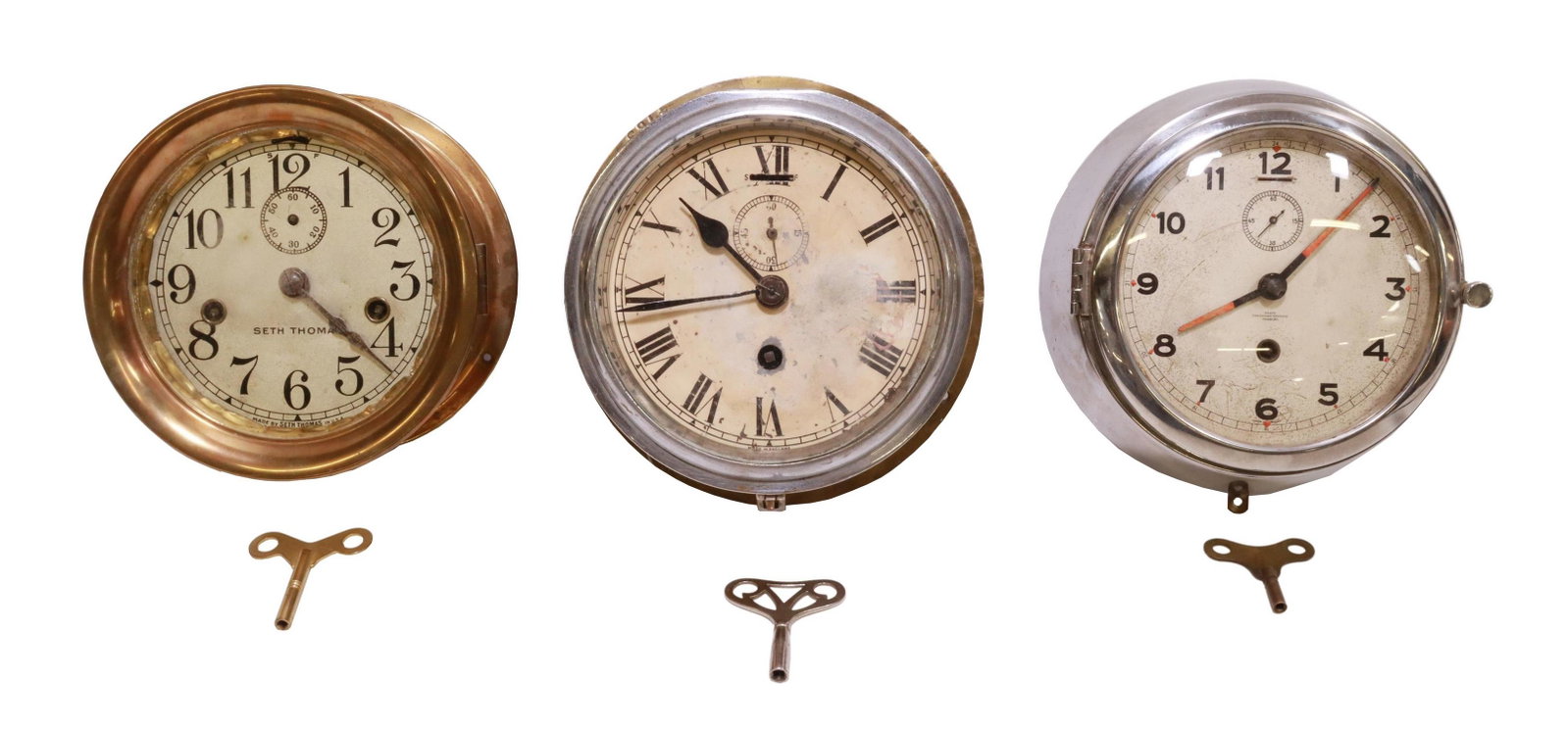 (3) ENGLISH, AMERICAN & GERMAN SHIP'S CLOCKS: (lot of 3) Ship's clocks, including: (1) English ship's clock, maker's name mostly obscured, Roman numeral hour markers, seconds subdial, time-only movement, outside edge stamped ESR 4763, approx 8"di