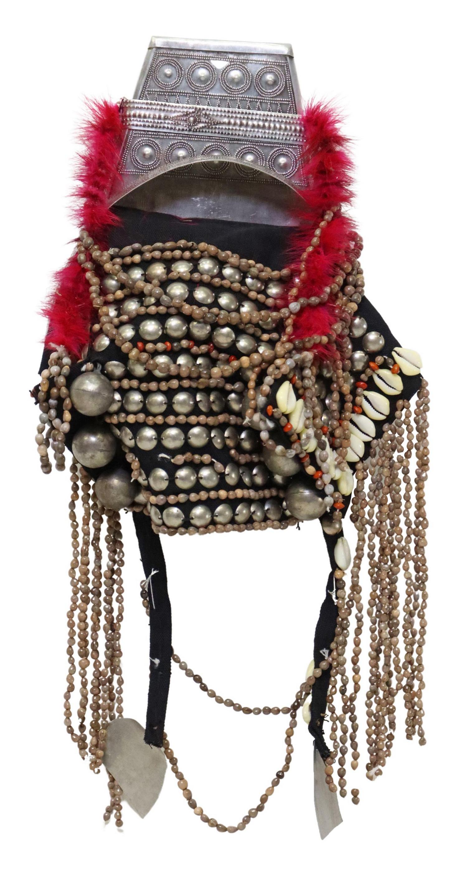 AKHA WOMEN'S HEADDRESS, SOUTHEAST ASIA: Akha women's headdress, the Akha peoples, Southeast Asia including Thailand, Myanmar, and Laos, shaped repousse crown, adorned with pink feathers, ornamented with beads, metal beads, and cowrie shells