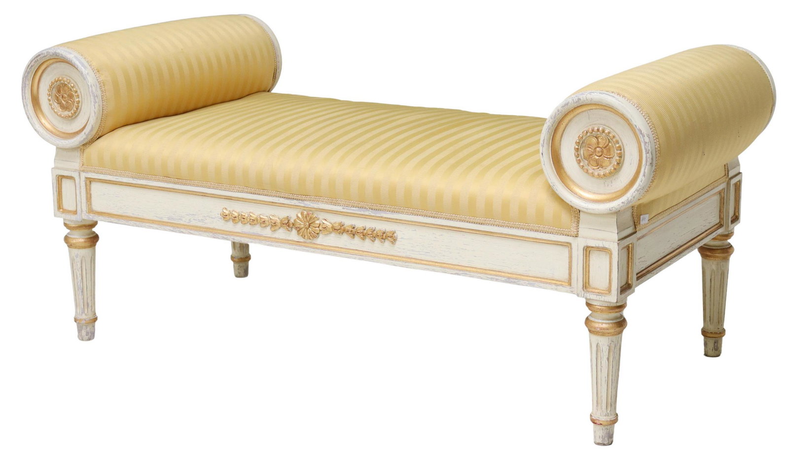 LOUIS XVI STYLE PAINTED PARCEL GILT CHAISE LOUNGE: Louis XVI style chaise lounge, 20th c., painted frame, having rolled arms, in a striped upholstery, with parcel gilt floral motifs, rising on fluted and tapered legs, approx 24.25"h, 53.25"w, 24.5"d,