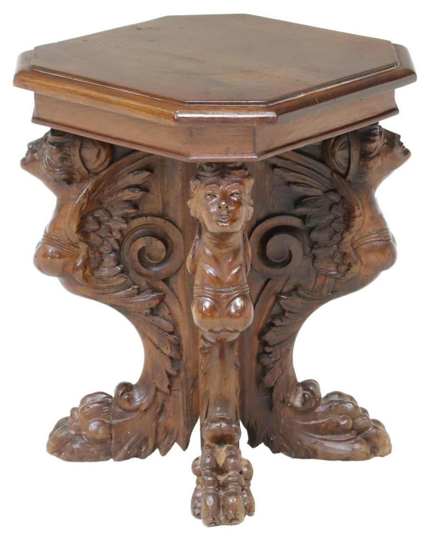 ITALIAN RENAISSANCE REVIVAL FIGURAL CARVED STAND: Italian Renaissance Revival carved walnut stand, 20th c., having octagonal top, rising on quadripartite base, carved with female caryatids, ending on paw feet, approx 19.5"h, 15.75"diam Start Price: $