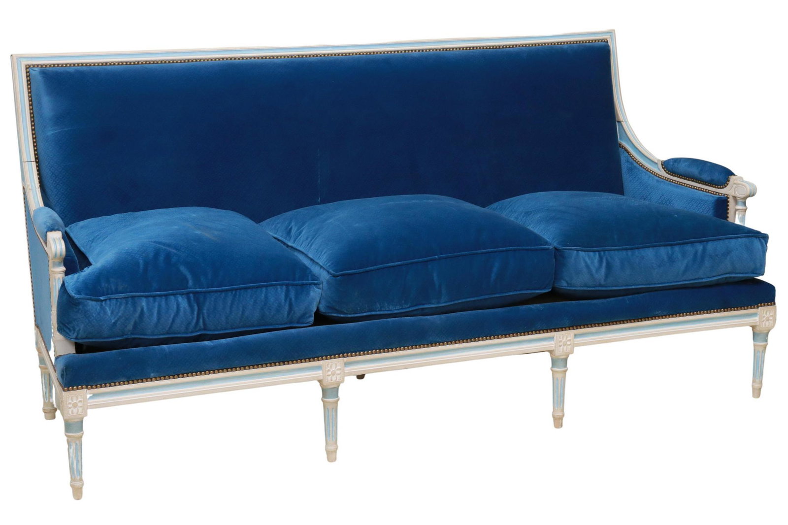FRENCH LOUIS XVI STYLE BLUE VELVET THREE-SEAT SOFA: French Louis XVI style sofa, 20th c., having painted wood frame, diamond patterned blue velvet upholstery, removable seat cushions, nailhead trim, rising on fluted tapered legs, ending in arrow feet, 