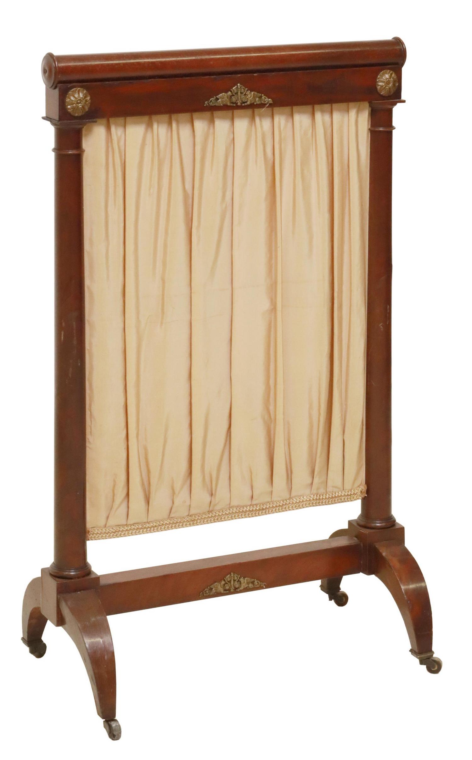 FRENCH EMPIRE STYLE MAHOGANY FIREPLACE SCREEN: French Empire style mahogany fireplace screen, 19th c., with gilt-mount mounts, "rolling pin" top rail, pleated fabric, curved legs on casters, approx 36.5"h, 22.5"w, 12.75"d Start Price: $150.00