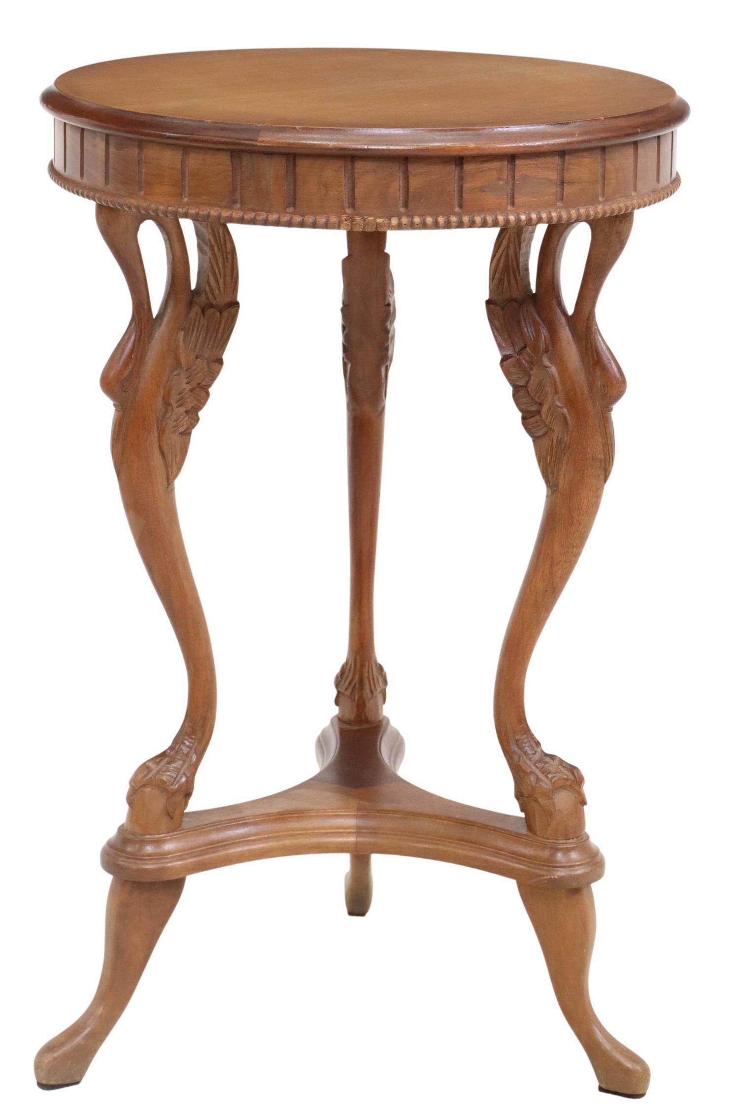 ITALIAN NEOCLASSICAL STYLE WALNUT SWAN PEDESTAL: Italian Neoclassical style carved walnut figural side table, 20th c., having circular top with beaded trim, rising on swan-form tripartite base, joined by stretcher, ending in flared feet, approx 23"h