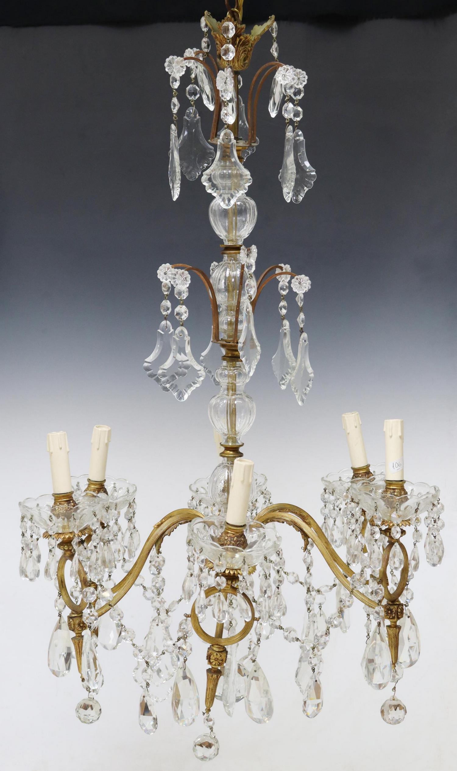 ITALIAN MOLDED GLASS & CRYSTAL 6-LIGHT CHANDELIER: Italian six-light chandelier, 20th c., having molded glass standard, issuing foliated arms, ending in fluted ring accents and floral bobeches, hung with pendalogues and prisms throughout, in need of w