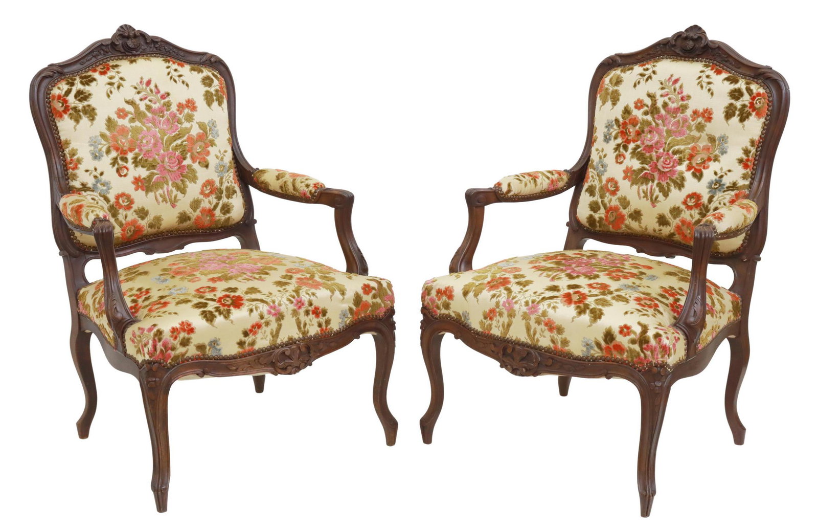 (2) FRENCH LOUIS XV STYLE SALON FAUTEUILS: (pair) French Louis XV style armchairs, late 19th/ early 20th c., having carved rocaille foliate crest, polychrome floral upholstery, with nailhead trim, scrolled handholds, rising on cabriole legs, e