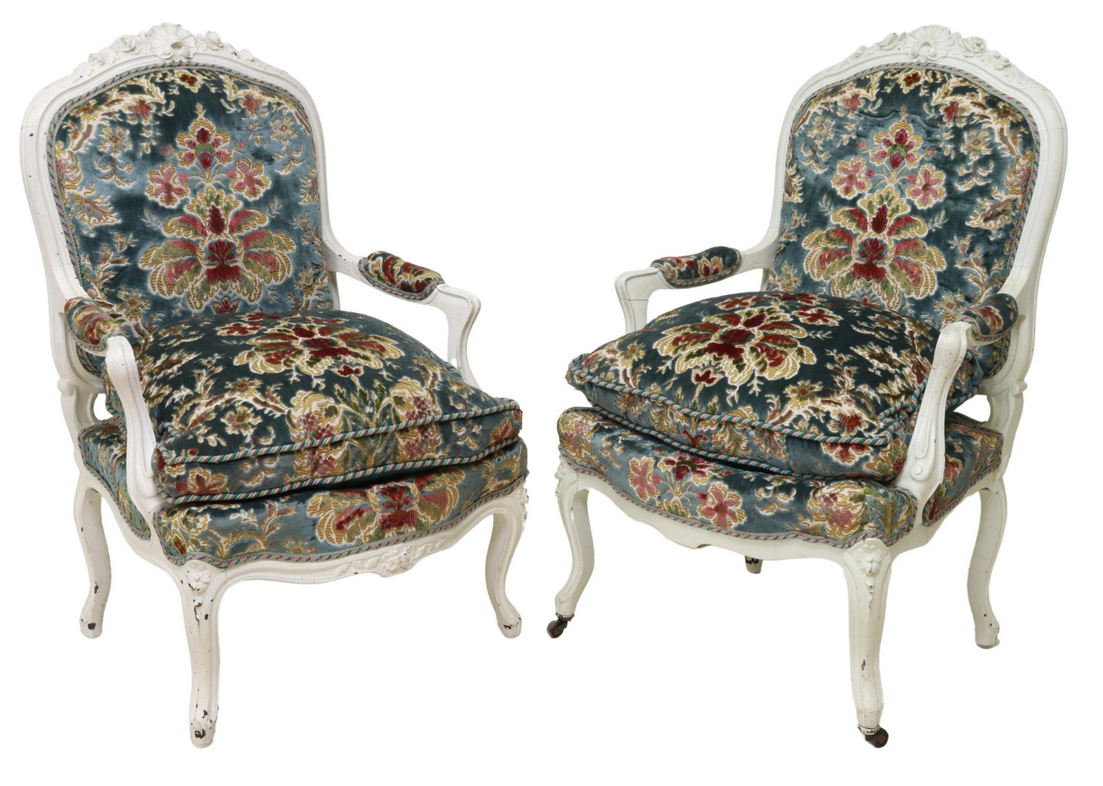 (2) FRENCH LOUIS XV STYLE UPHOLSTERED FAUTEUILS: (pair) French Louis XV style armchairs, 20th c., white-painted frames, carved shell and floral crest, upholstered back, loose seat cushion, rising on cabriole legs, (one) with front casters, approx 40
