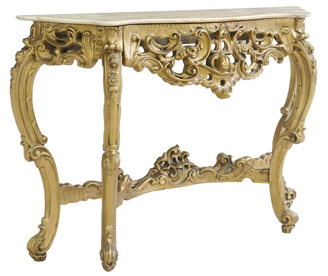 LOUIS XV STYLE GILTWOOD MARBLE-TOP CONSOLE TABLE: Louis XV style giltwood console table, 20th c., having marble top, over pierced foliate apron, rising on cabriole legs, joined with center stretcher, ending on whorl feet, approx 32.5"h, 49.5"w, 14"d 