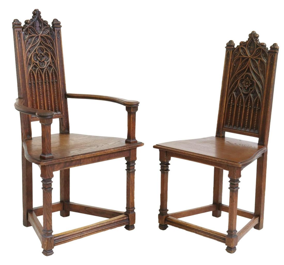 (6) FRENCH GOTHIC REVIVAL OAK ARM & SIDE CHAIRS: (lot of 6) French Gothic Revival oak chairs, late 19th/ early 20th c., having carved tracery back, over shaped seat, rising on turned legs, joined with box stretcher, including: (1) armchair, approx 4
