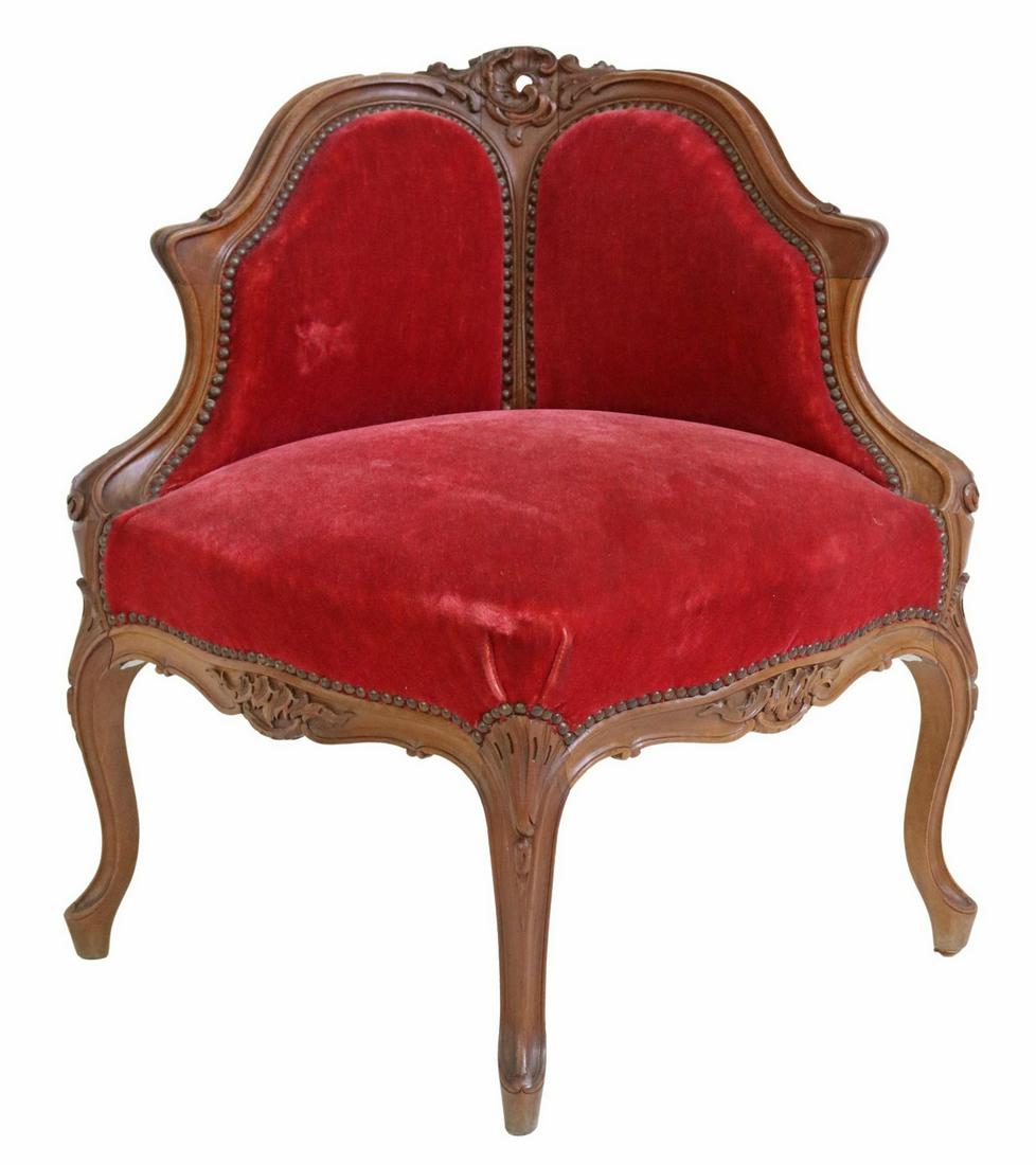 FRENCH LOUIS XV STYLE CARVED CORNER CHAIR: French Louis XV style corner chair, 20th c., having carved rocaille crest, in a mohair upholstery, with nailhead trim, rising on cabriole legs, approx 27"h, 29.25"w, 28"d, seat height: approx 16.5"h S