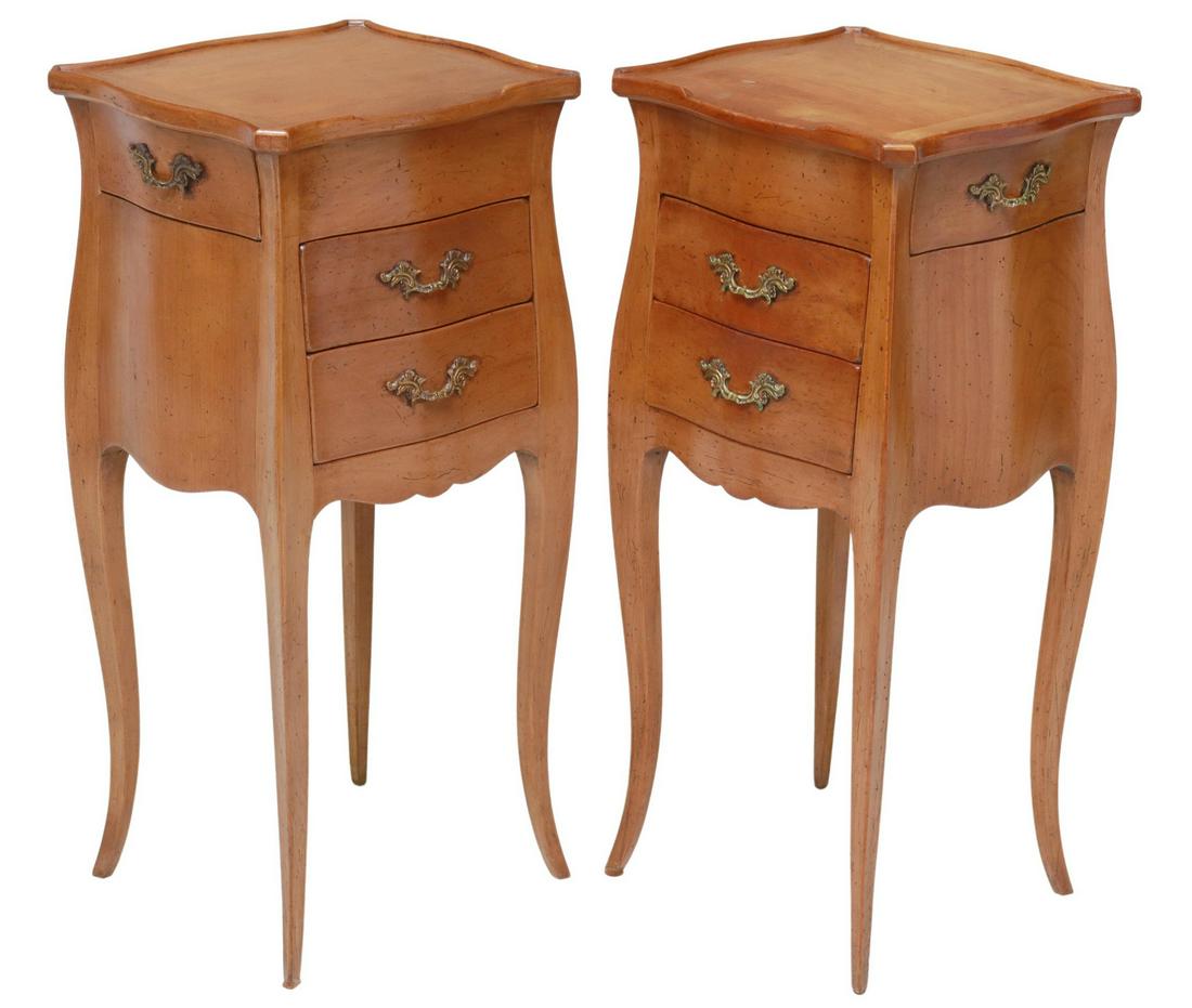 (2) FRENCH LOUIS XV STYLE FRUITWOOD NIGHTSTANDS: (pair) French Louis XV style fruitwood nightstands, 20th c., having shaped top, over two drawers with gilt metal pulls, each fitted with single faux side drawer, rising on cabriole legs, approx 27 3/8