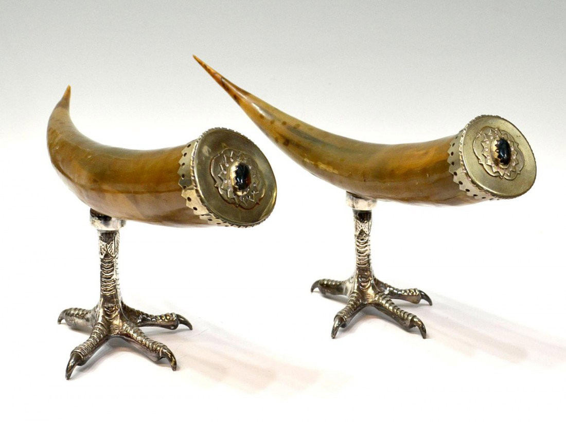 PAIR HORN & SILVER PLATE TALON GARNITURES: (pair) Horn garnitures, each fitted with decorative end piece set with oval cabochon, rising on a silver plate talon foot, approx 8"h, 16"l, 5lbs total Start Price: $150.00