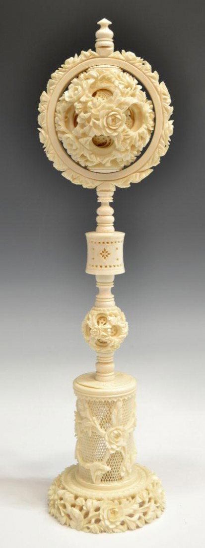 LARGE EXTRA FINE CHINESE CARVED IVORY PUZZLE BALL: **This lot will not be shipped Internationally** Large Chinese carved ivory puzzle ball on stand, the main ball carved as a profusion of flowers, encasing a number of graduated reticulated balls, set 