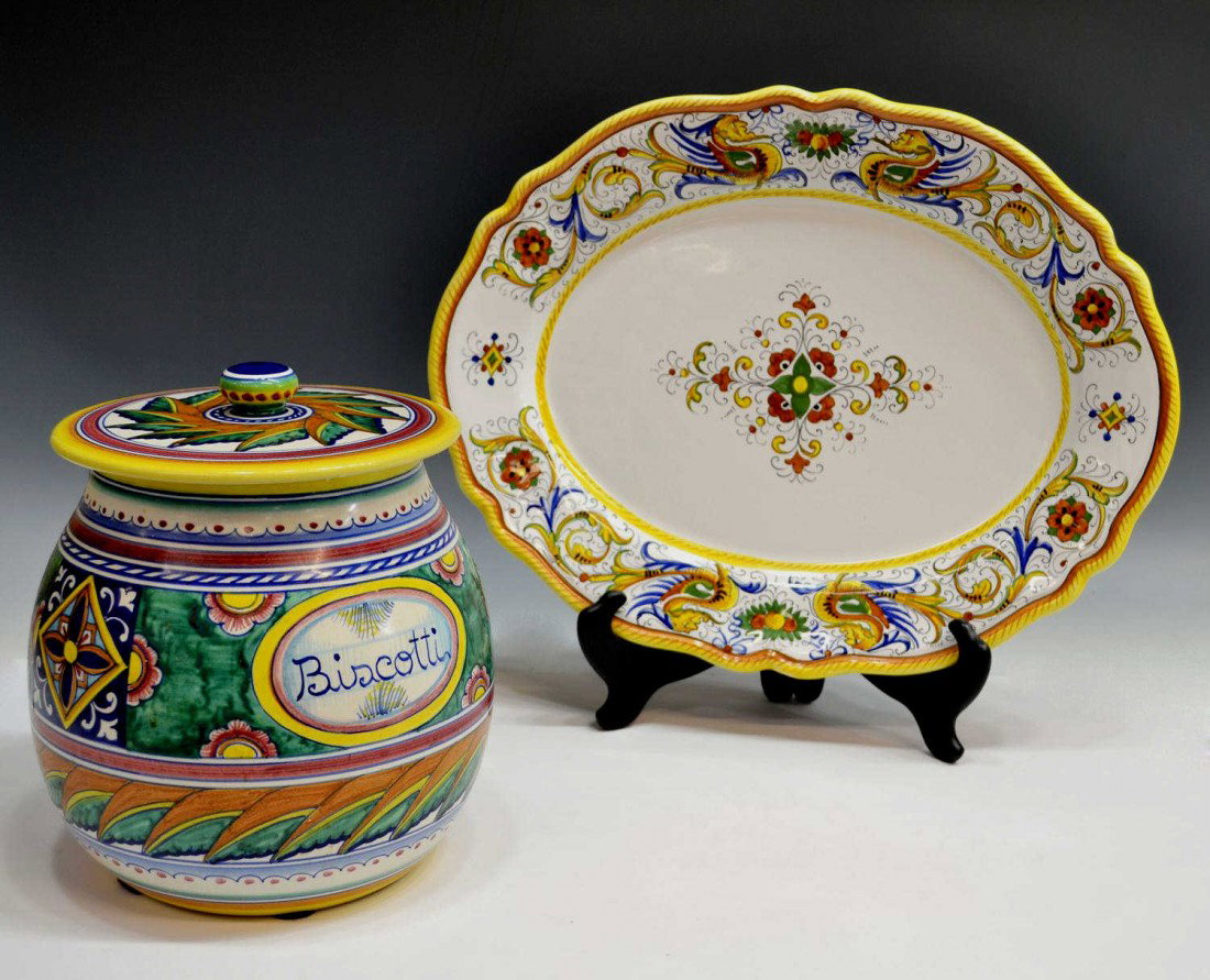ITALIAN FRATELLI MARI DERUTA CERAMIC JAR & PLATTER: (lot of 2) Italian hand painted ceramics, Fratelli Mari Deruta, comprising : (1) covered 'Biscotti' jar, bright stylized paint decoration throughout, approx 9"h, 7"w; (1) large oval platter, stylized 