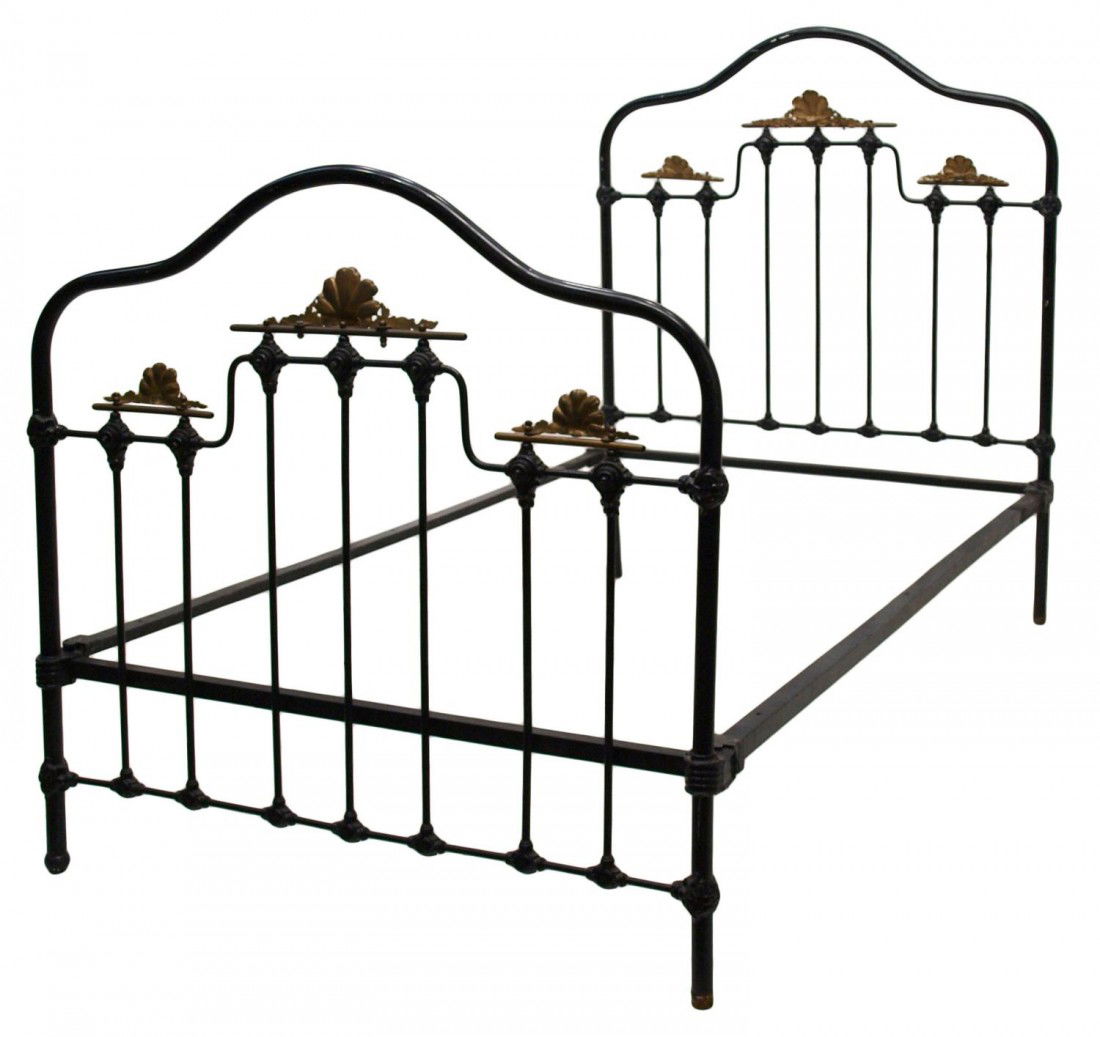 CAST IRON BED WITH ORNATE BRASS SHELL ACCENTS: Ornate cast iron bed with brass foliate and shell accents, overall: 61"h, 48.5"w Start Price: $100.00