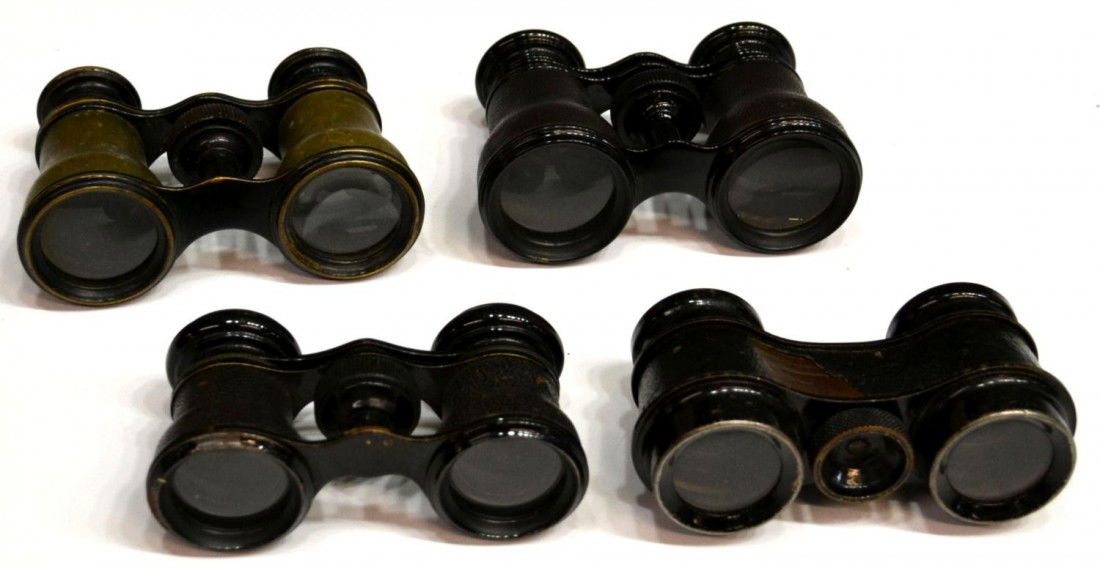 ANTIQUE / VINTAGE FRENCH OPERA / FIELD GLASSES: (lot of 4) French opera / field glasses, (2) Lemaire, (1) Marchand, (1) unmarked, several examples having leather sights, some loss and wear overall, largest: 2.5"h, 4"w, 1.25lbs total Start Price: $8
