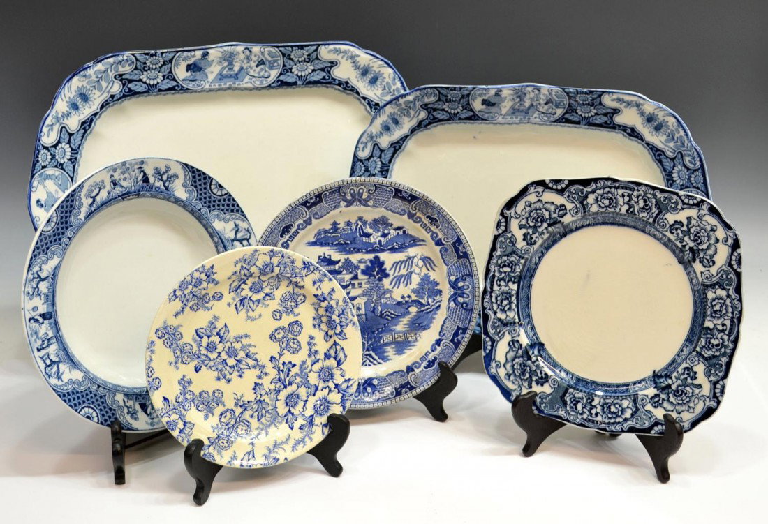 CONTINENTAL BLUE & WHITE PORCELAIN, DAVENPORT: (lot of 6) Collection of Continental blue and white porcelain tableware, including plates, service platters and a bowl various decorations, one plate in the "Willow" pattern, others with floral decora