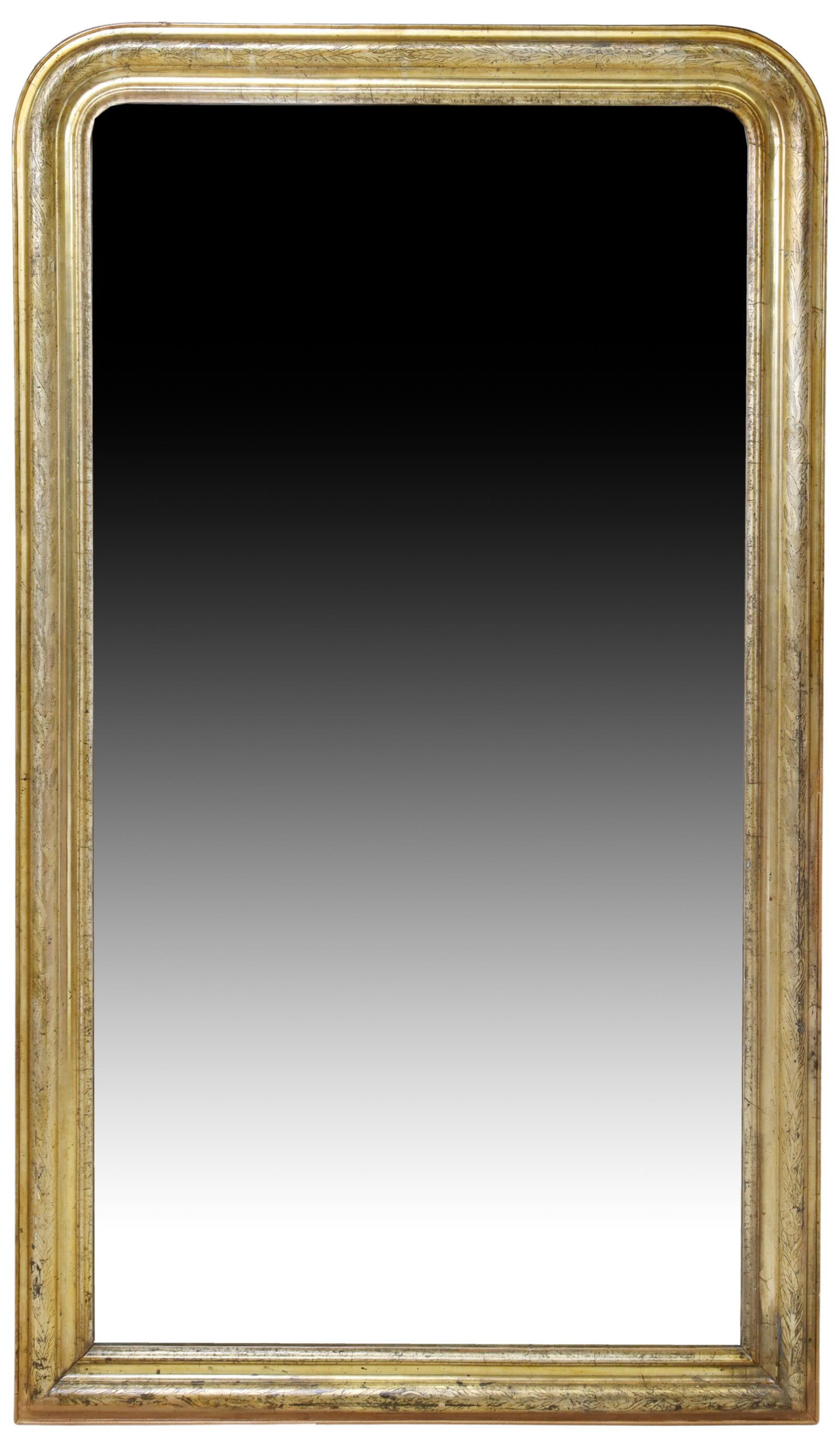FRENCH LOUIS PHILIPPE PERIOD GILTWOOD MIRROR: French Louis Philippe period giltwood wall mirror, mid 19th c., having arched frame with incised foliate motifs, encasing flat mirror plate, approx 75"h, 44"w, 104lbs Start Price: $800.00