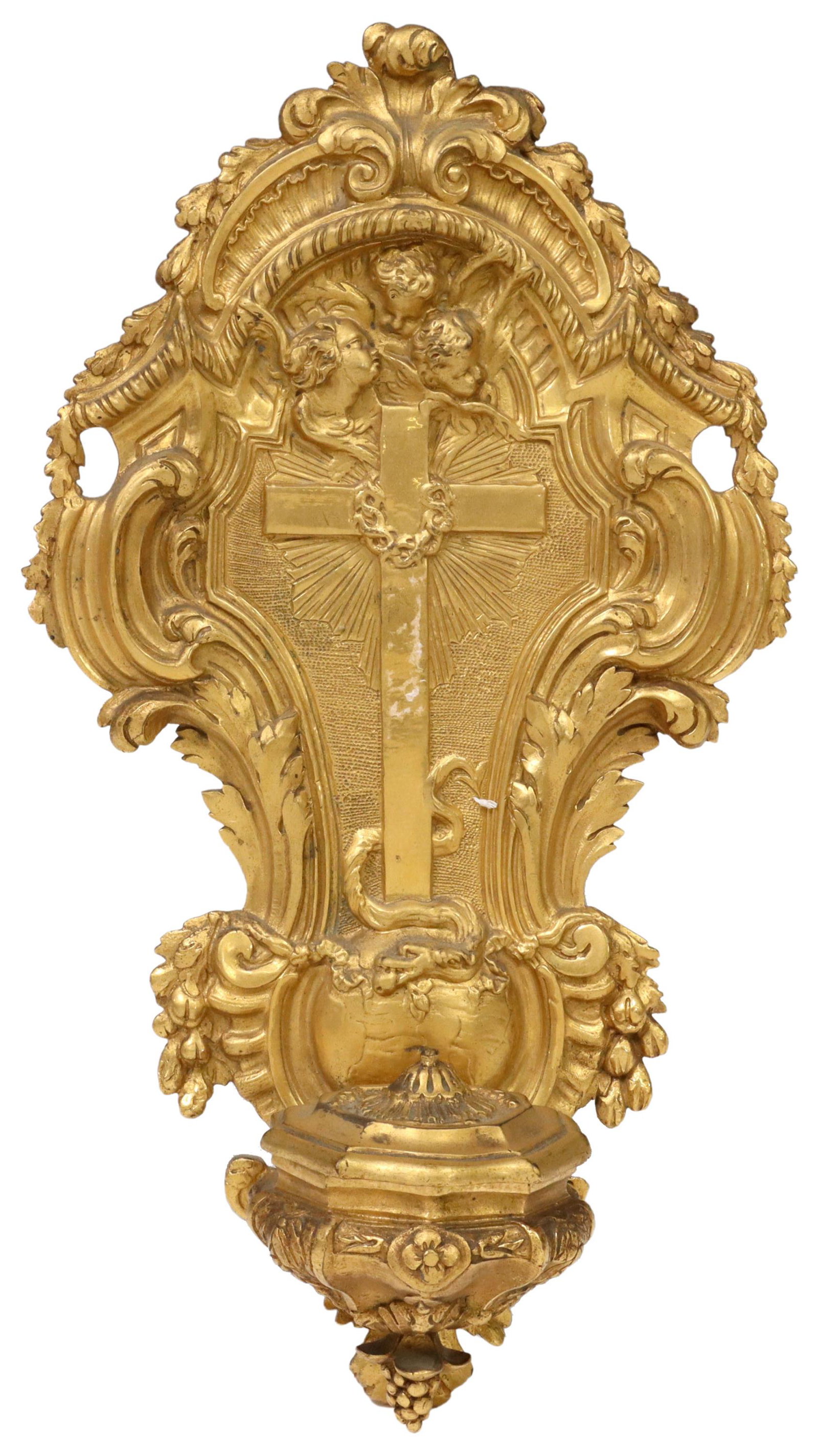 FRENCH ORMOLU HOLY WATER FONT, 19TH C.: French bronze dore holy water font, 19th c., cartouche-shaped backplate, cast with foliate scrolls, putti masks in relief, central cross over a serpent, over the font with hinged lid, approx 10.5"h, 6