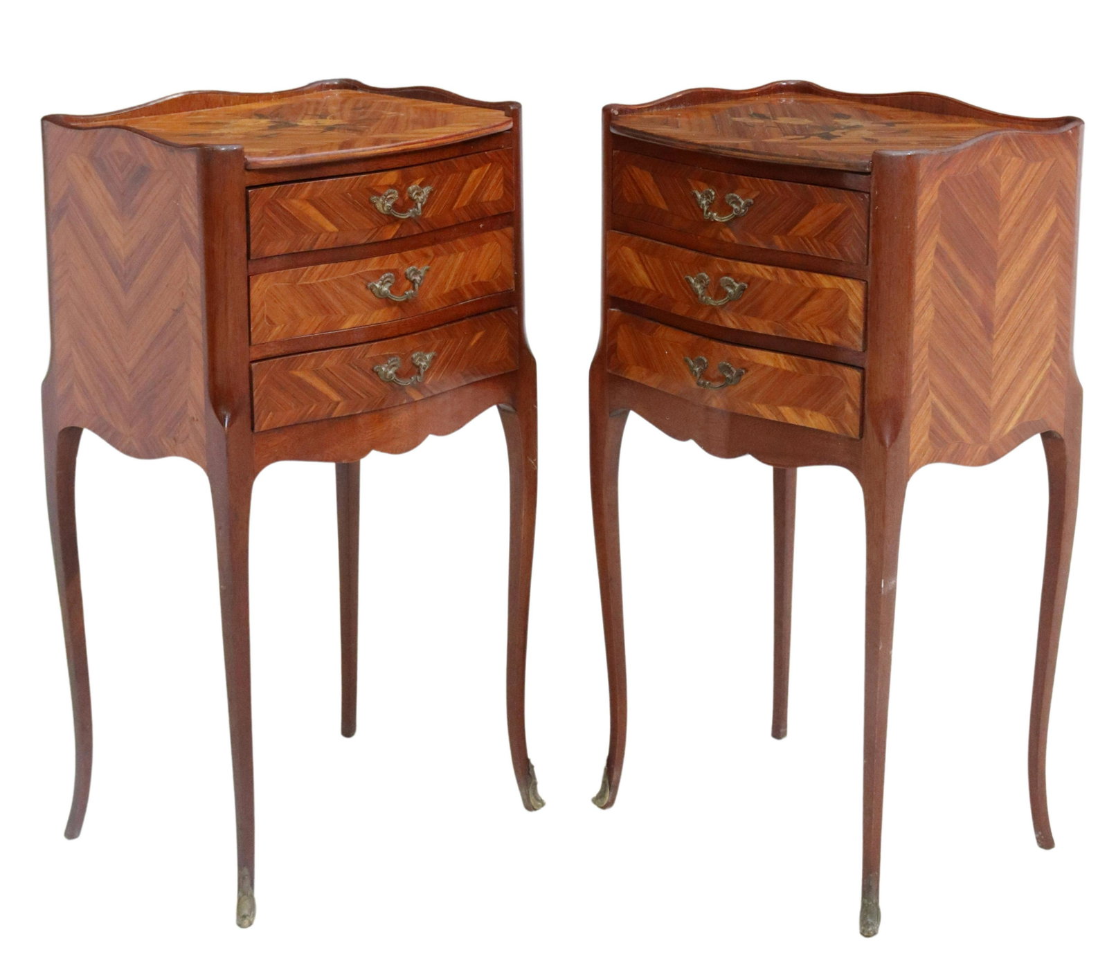 (2) FRENCH LOUIS XV STYLE MARQUETRY NIGHTSTANDS: (pair) French Louis XV style matched veneer nightstands, 20th c., case with floral marquetry, three drawers, rising on cabriole legs, ending in sabots, approx 29.5"h, 15.5"w, 12.75"d Start Price: $250