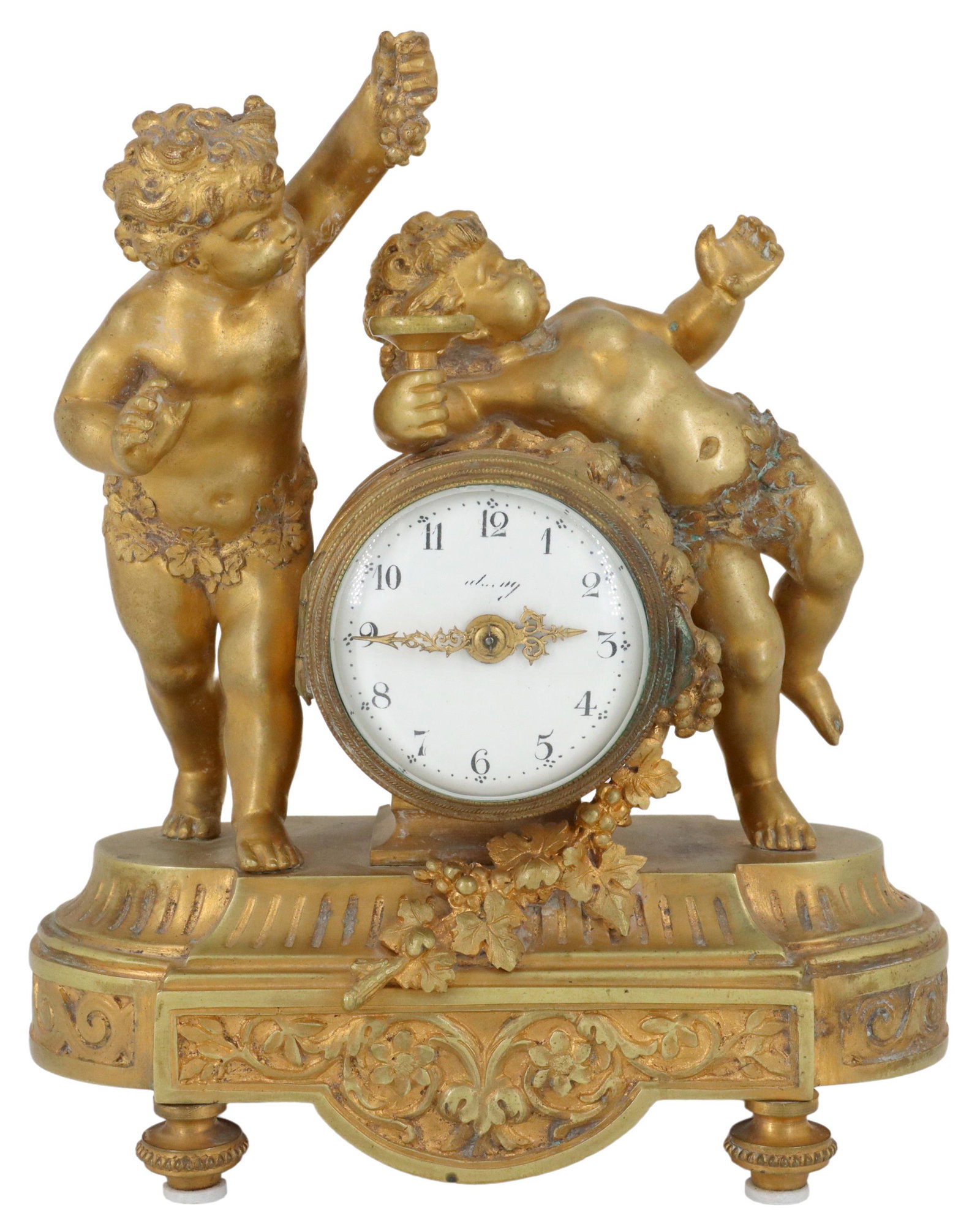 PETITE FRENCH LOUIS XVI STYLE ORMOLU SHELF CLOCK: French Louis XVI style bronze dore clock, after the model by Clodion (Michel Claude Clodion, French, 1738-1814), late 19th/ early 20th c., Bacchanalian putti leaning against a wine barrel, housing the