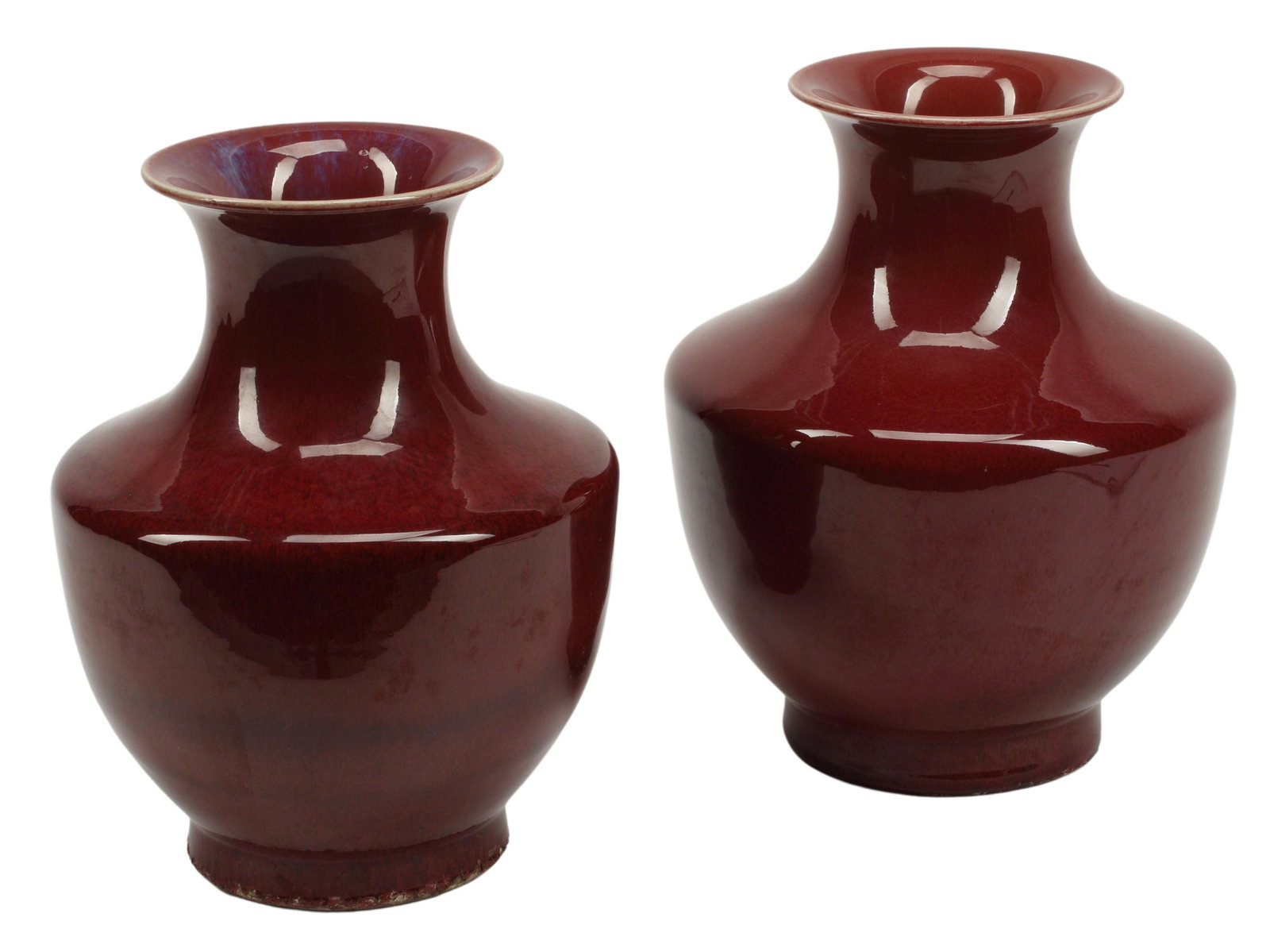 (2) CHINESE SANG DE BOEUF PORCELAIN VASES: (pair) Chinese oxblood porcelain vases, chipping at feet, approx 10.5"h, 8.5"diam, 13lbs total Start Price: $200.00