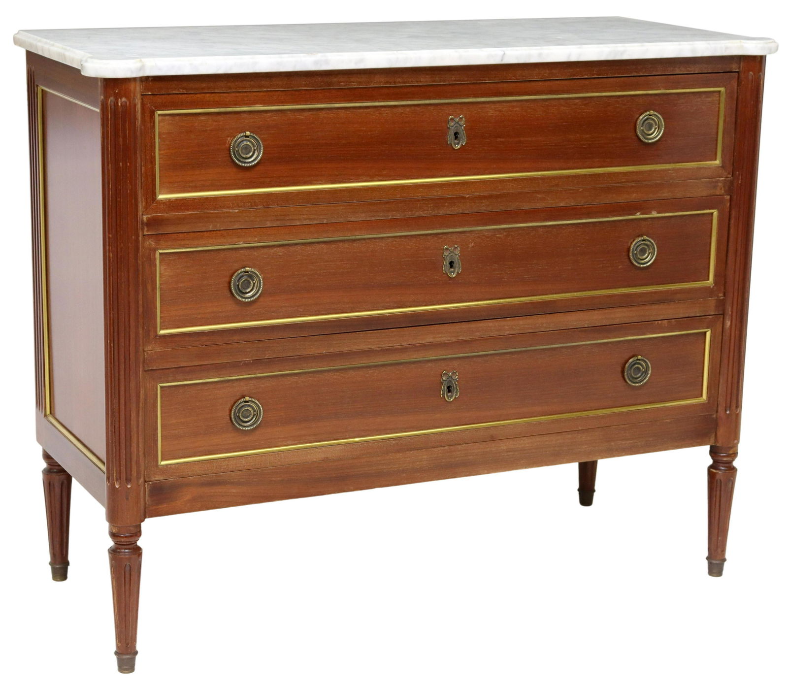 FRENCH LOUIS XVI STYLE MARBLE-TOP MAHOGANY COMMODE: French Louis XVI style marble-top mahogany commode, 20th c., three drawers with gilt metal trim, fluted corner posts, rising on tapered legs, approx 32.5"h, 40.75"w, 17"d Start Price: $400.00