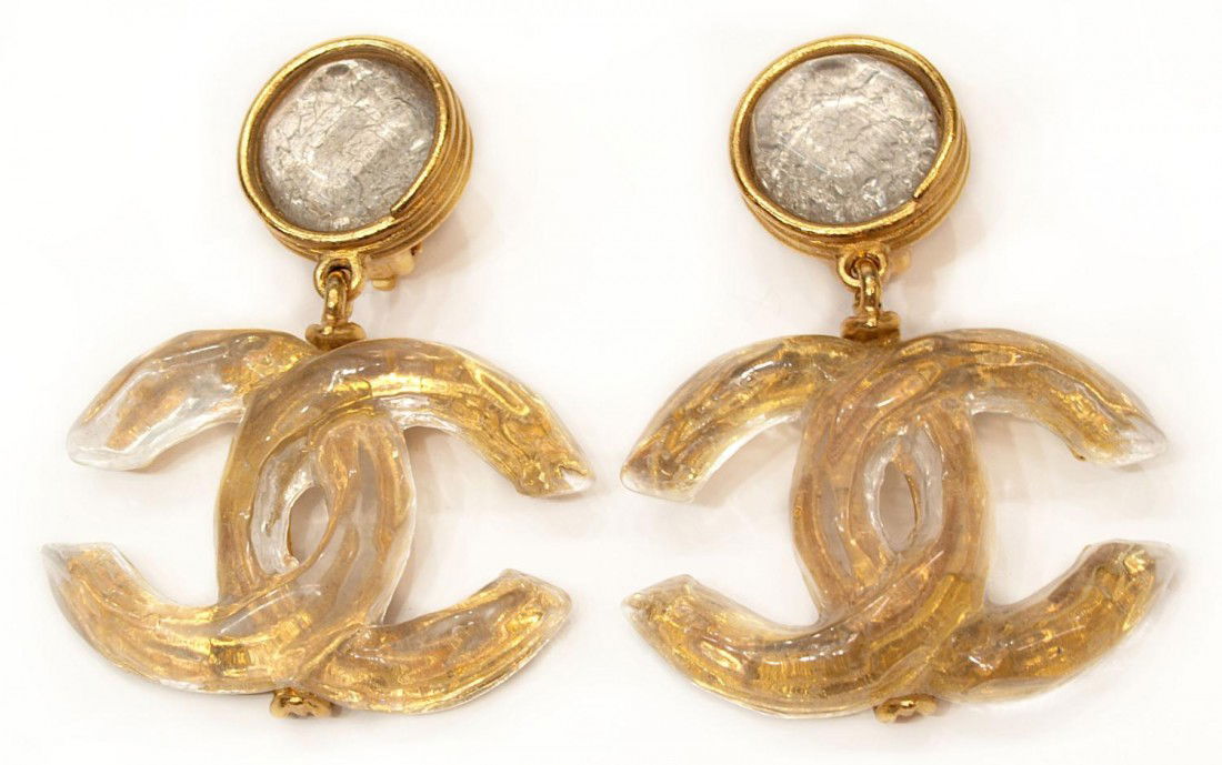 VINTAGE CHANEL LOGO DANGLE EARRINGS, SPRING 1999: Vintage Chanel costume gold tone and clear dangling logo clip earrings with oval maker marker on the back of each earring signed C CHANEL R, 99 CC P, MADE IN FRANCE, from Spring 1999, 2"l**Note: All C