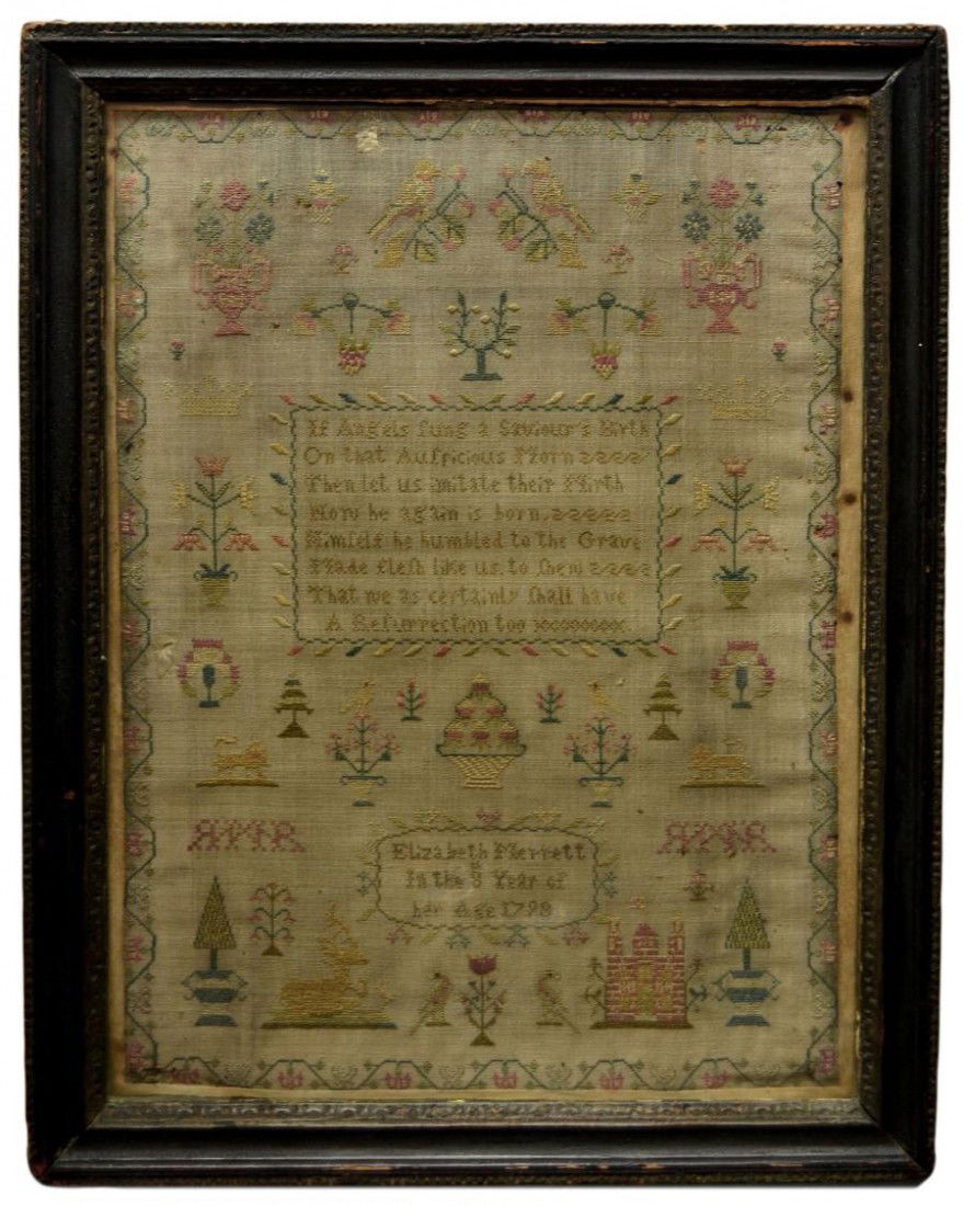 BRITISH STUDENT'S SAMPLER, ELIZABETH MERRETT, 1798: Framed English sampler by Elizabeth Merrett, sewn on linen, a castle, lions, vases, birds and flowers surround a central reserve with a religious verse, signed below within a floral border "Elizabeth