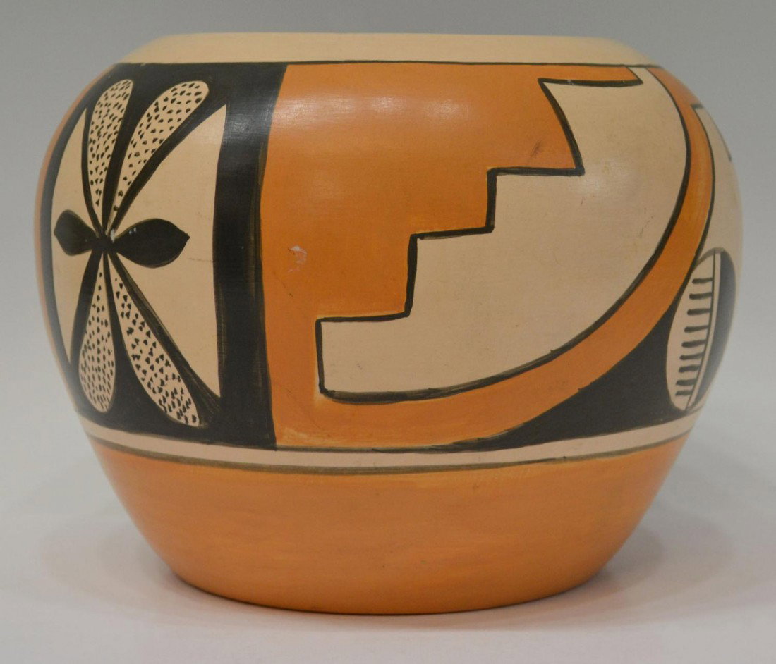 ACOMA OLLA POTTERY, SIGNED: Acoma Pueblo, New Mexico pottery, an olla decorated in geometric designs with orange, cream and black colors, signed at base "ollie '75", 7"h, 9"d; 3lbs Start Price: $80.00