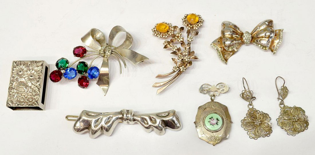 VINTAGE STERLING BROOCHES, JAY KELL, S KIRK & SON: (lot of 8) Collection of vintage brooches, mostly sterling: (1) Jay Kel sterling floral brooch in the form of two flowers, 3"; (1) marked sterling bow holding colored stones representing stylized flow