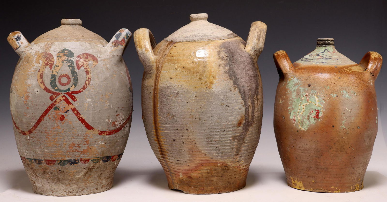 (3) FRENCH PROVINCIAL EARTHENWARE PAINTED OIL JUGS (1 of 3)