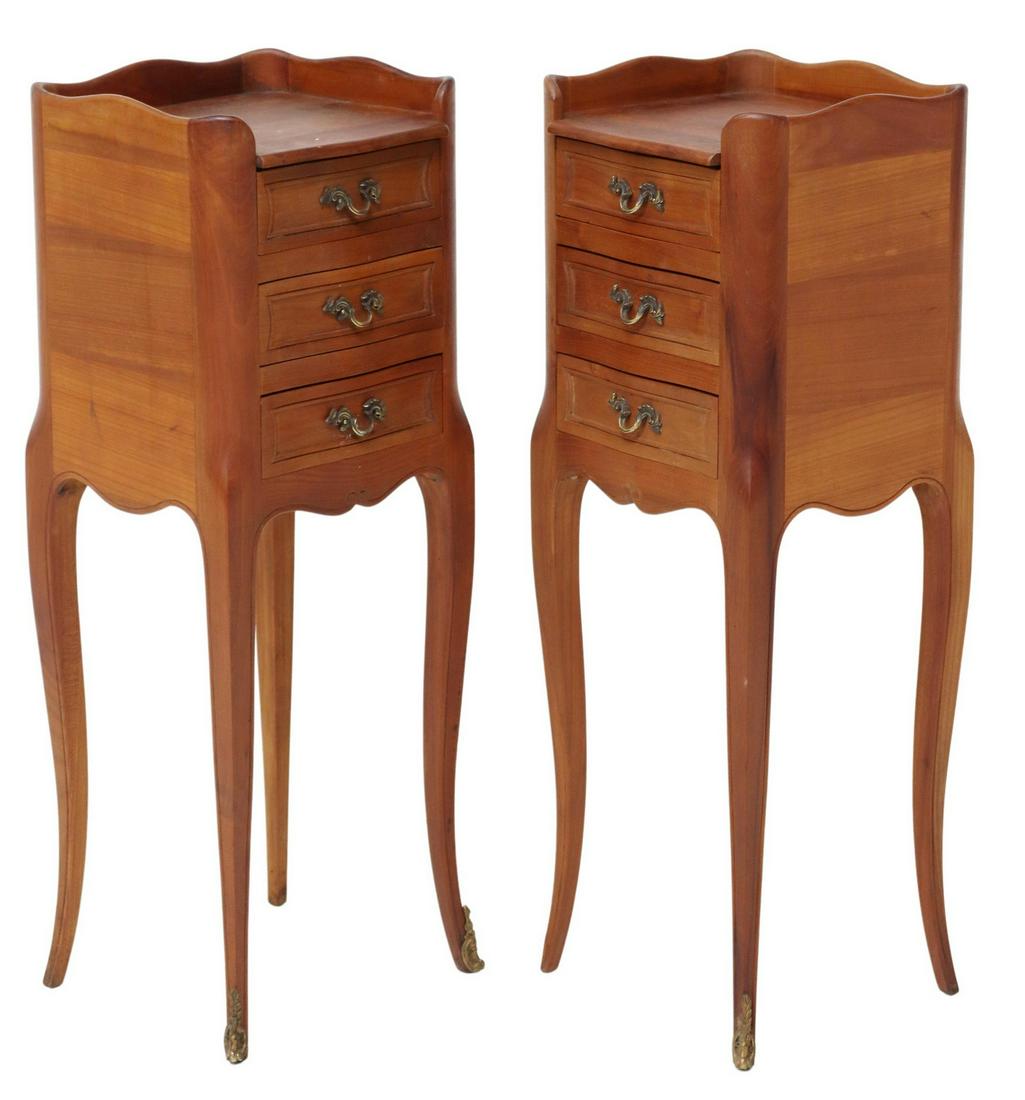 (2) FRENCH LOUIS XV STYLE FRUITWOOD NIGHTSTANDS: (pair) French Louis XV style fruitwood nightstands, early 20th c., having shaped top, over conforming case fitted with three drawers, rising on cabriole legs, ending in sabots, approx 27.5"h, 10"w, 9"