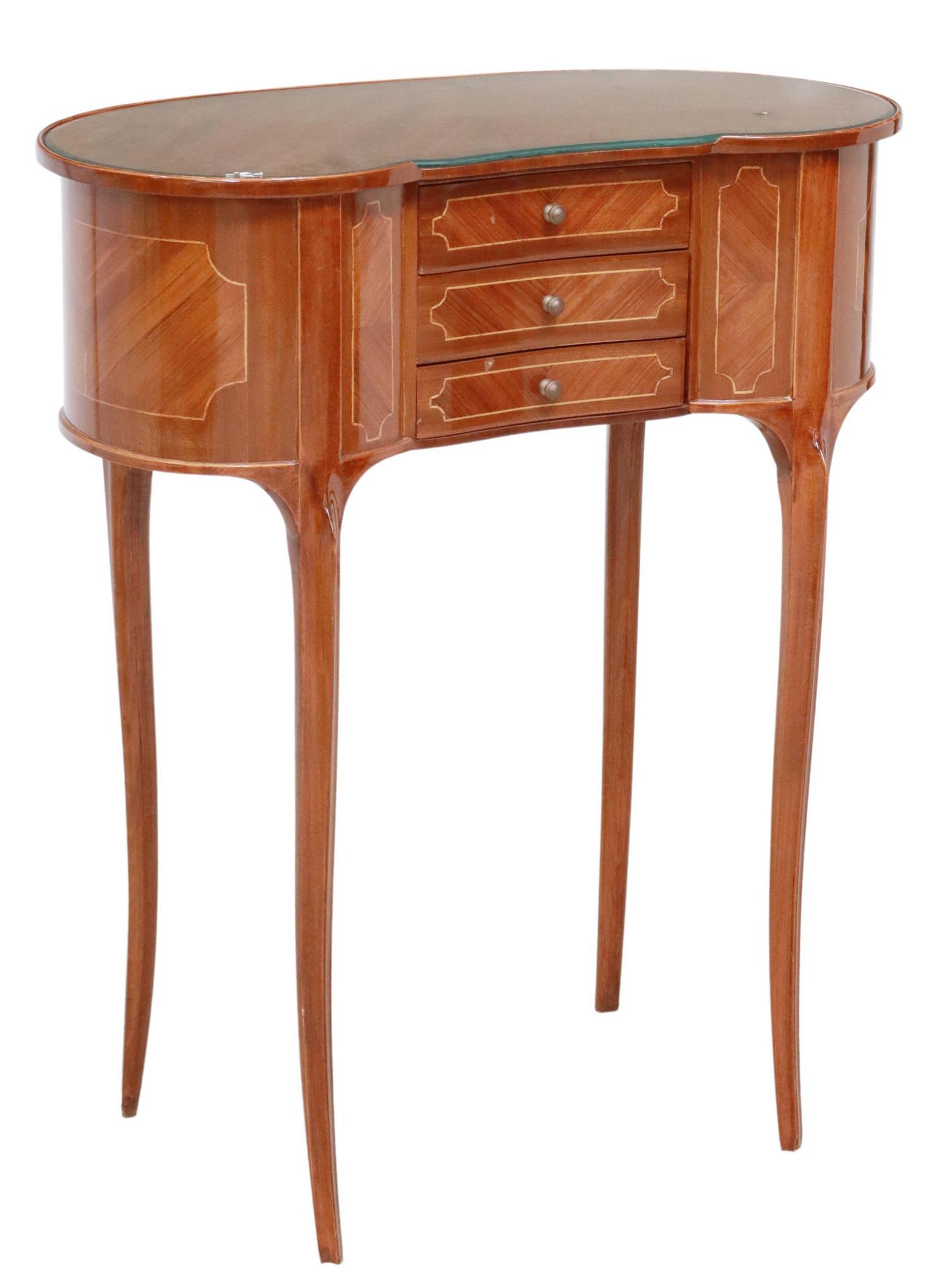 FRENCH LOUIS XV STYLE KIDNEY-FORM NIGHTSTAND: French Louis XV style kidney-form nightstand, 20th c., having matched veneer case with string inlay, inset glass top, over three drawers, rising on curved legs, approx 28.25"h, 24"w, 11.25"d Start Pri
