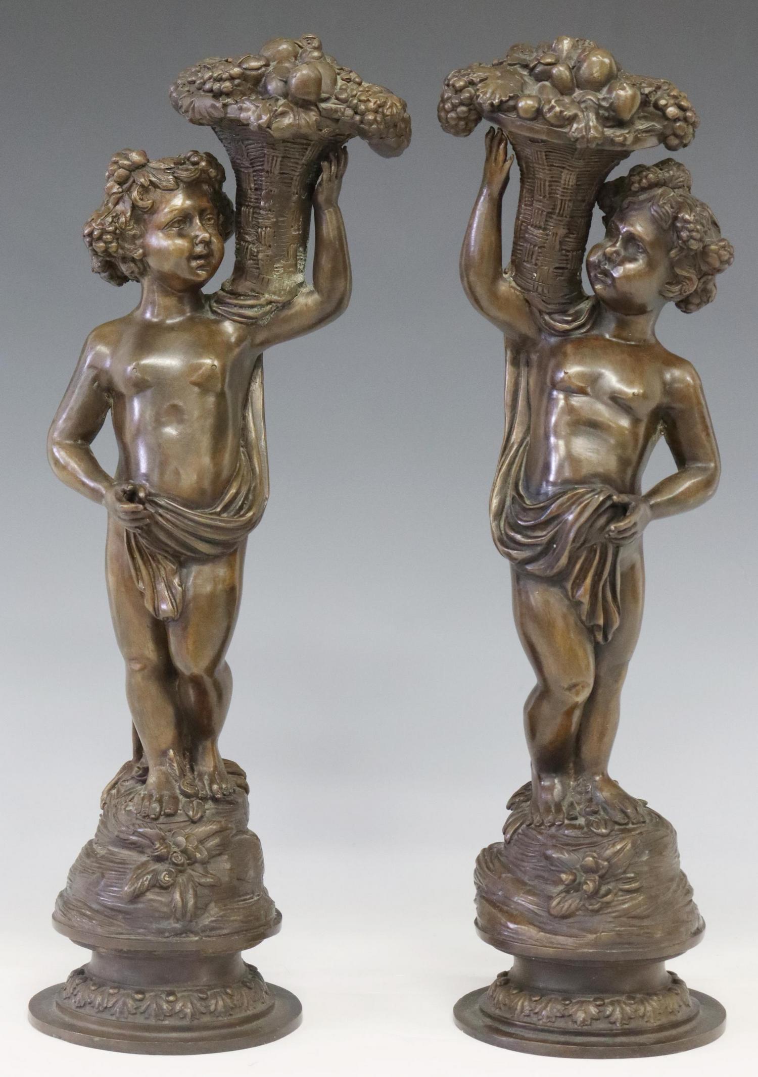 (2) BRONZE SCULPTURES PUTTI WITH FRUIT BASKETS (1 of 3)