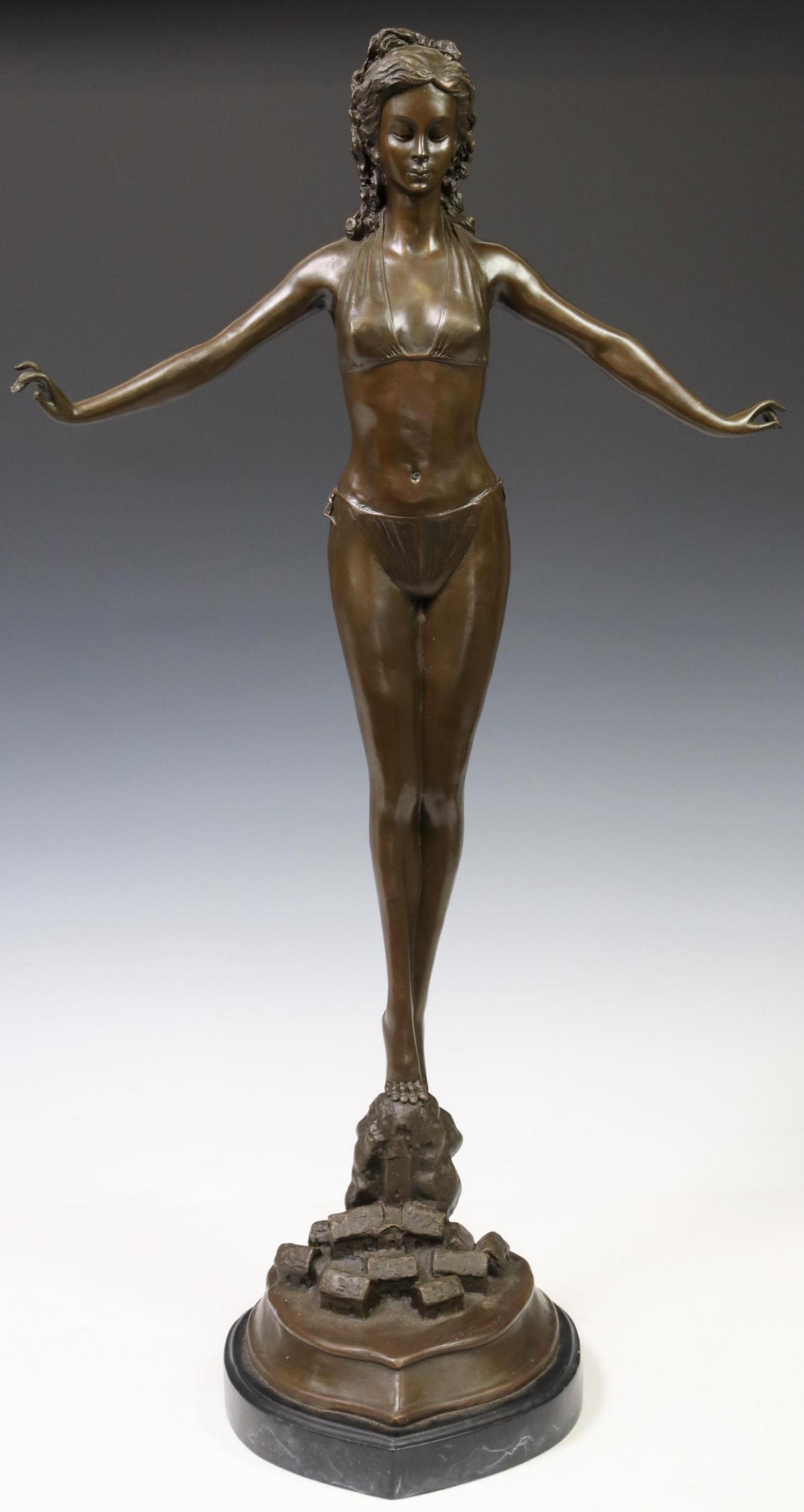 AFTER JULES JOUANT STANDING WOMAN BRONZE SCULPTURE: Patinated bronze sculpture, Standing Woman in Bikini, late 20th c., depicting woman in swimsuit balancing on rocks, signed in cast after Jules Jouant (French, 1863-1921), cast at Talos Gallery, Englan