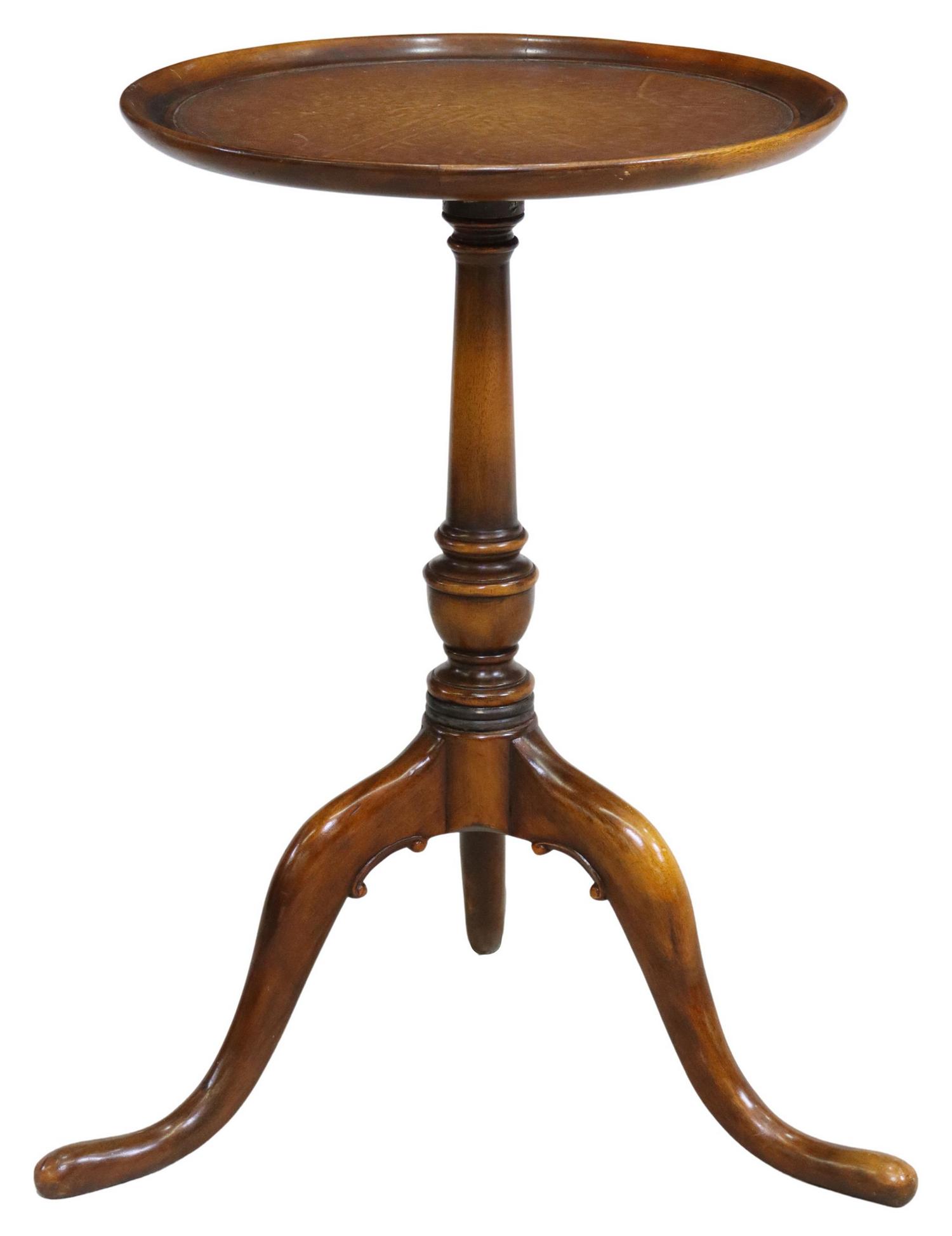 THEODORE ALEXANDER PEDESTAL SIDE TABLE: Wine table/ side table, Theodore Alexander, late 20th c., rotating dish top with inset leather surface, center pedestal, rising on three scroll legs, approx 26.5"h, 21.5"diam Start Price: $150.00