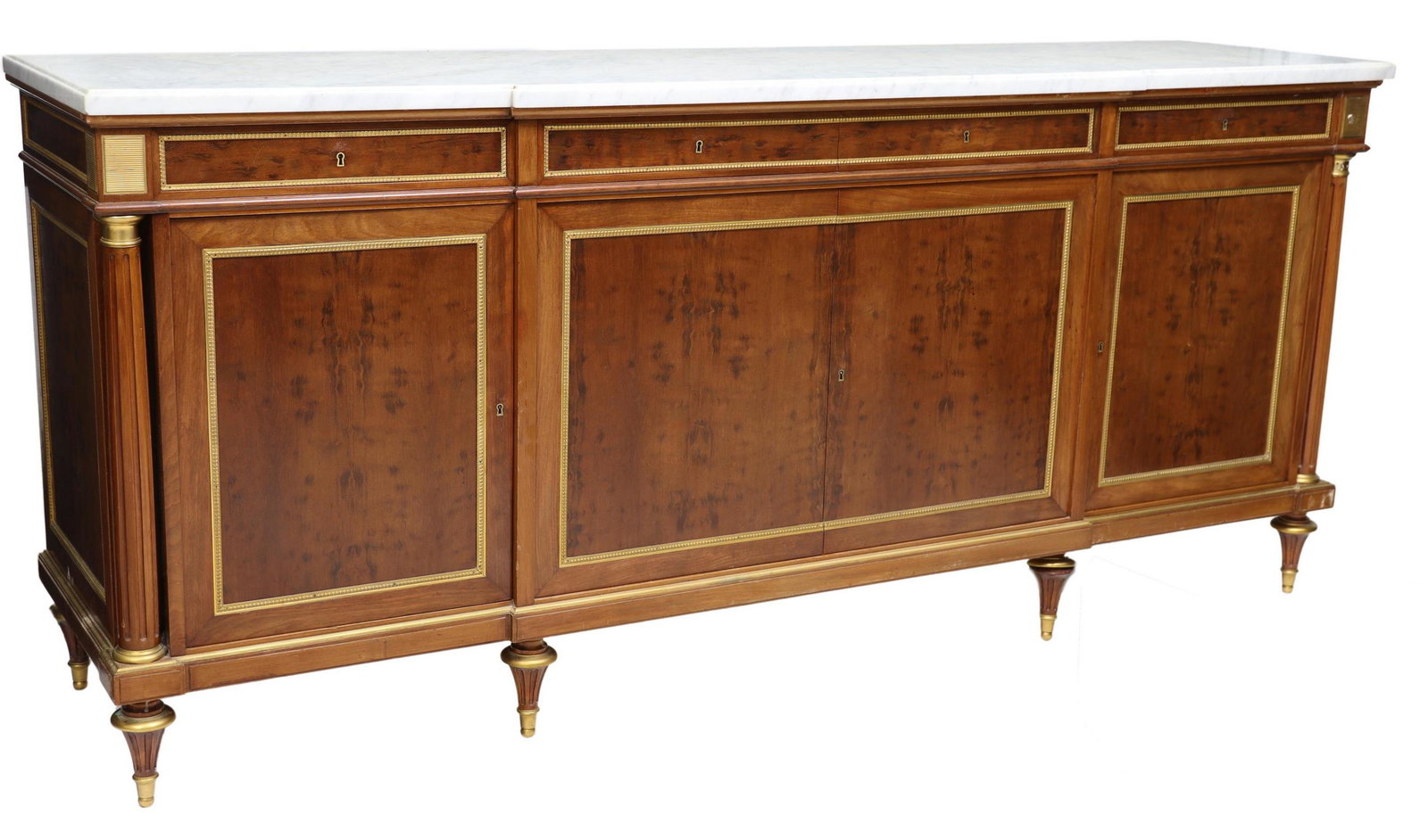 RINCK LOUIS XVI STYLE MARBLE & MAHOGANY SIDEBOARD: French Louis XVI style marble-top mahogany sideboard, M. Rinck, 20th c., breakfront case fitted with four drawers, over four cabinet doors, gilt metal trim, interior shelves, rising on tapering fluted