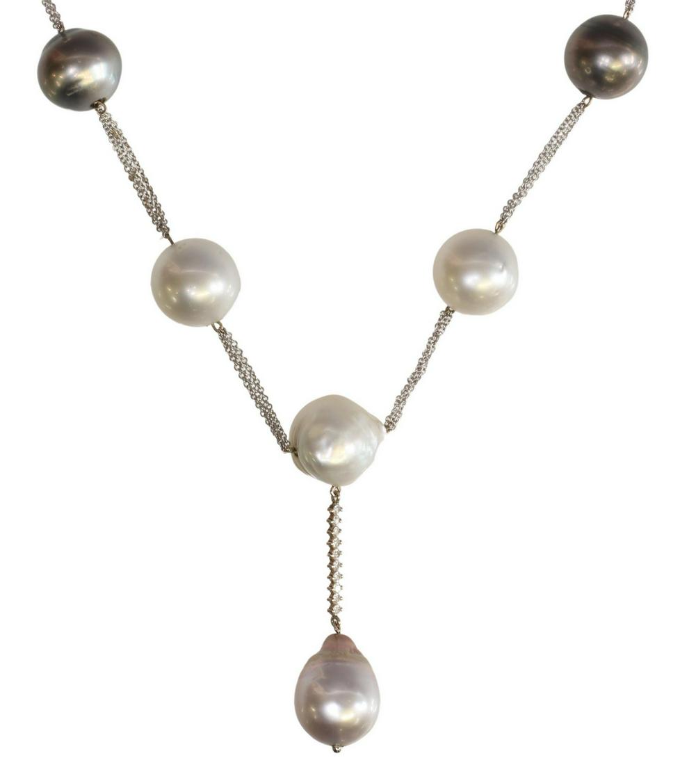ESTATE 14KT WG SOUTH SEA PEARL & DIAMOND NECKLACE: Estate 14kt white gold necklace, nine alternating Tahitian black and South Sea white round and baroque pearls, measuring approx 11.5 to 13.5 mm, spaced between sections of triple strands of fine chain